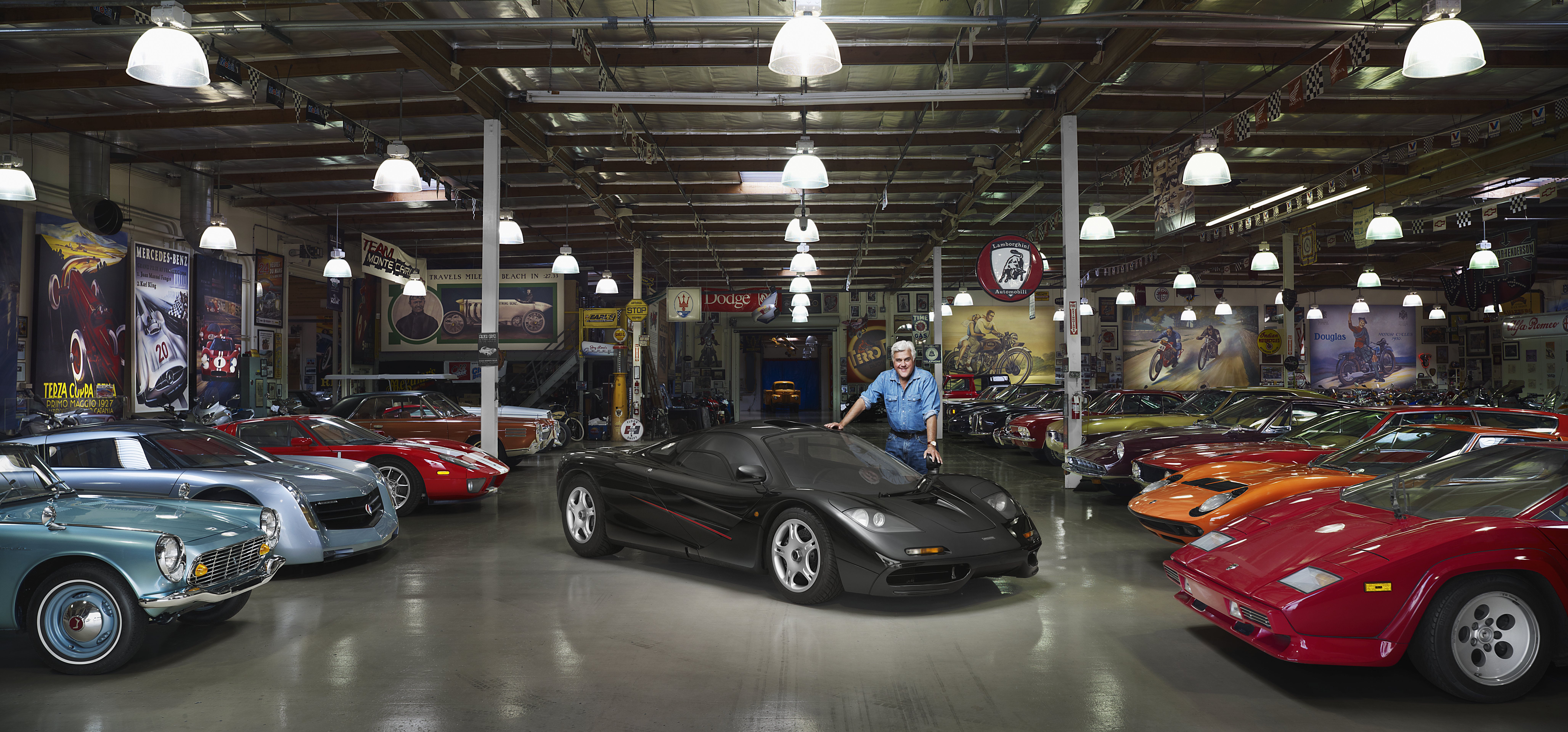 Jay Leno in his garage with his McLaren F1 on May 19, 2007 | Source: Getty Images