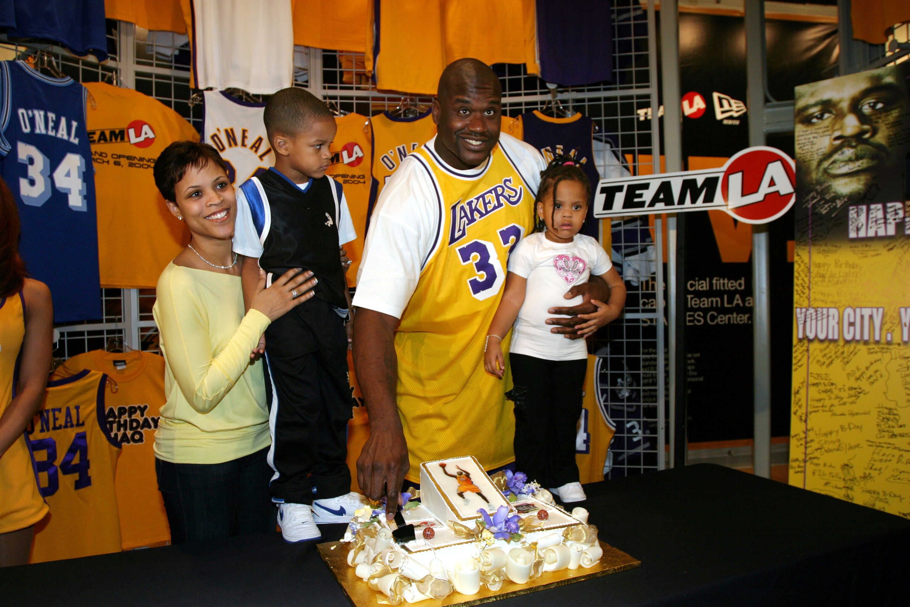 Shaquille O'Neal with ex-wife Shaunie and his children Shareef and Amirah at the opening of Team LA Store in 2004 in Los Angeles, California | Source: Getty Images