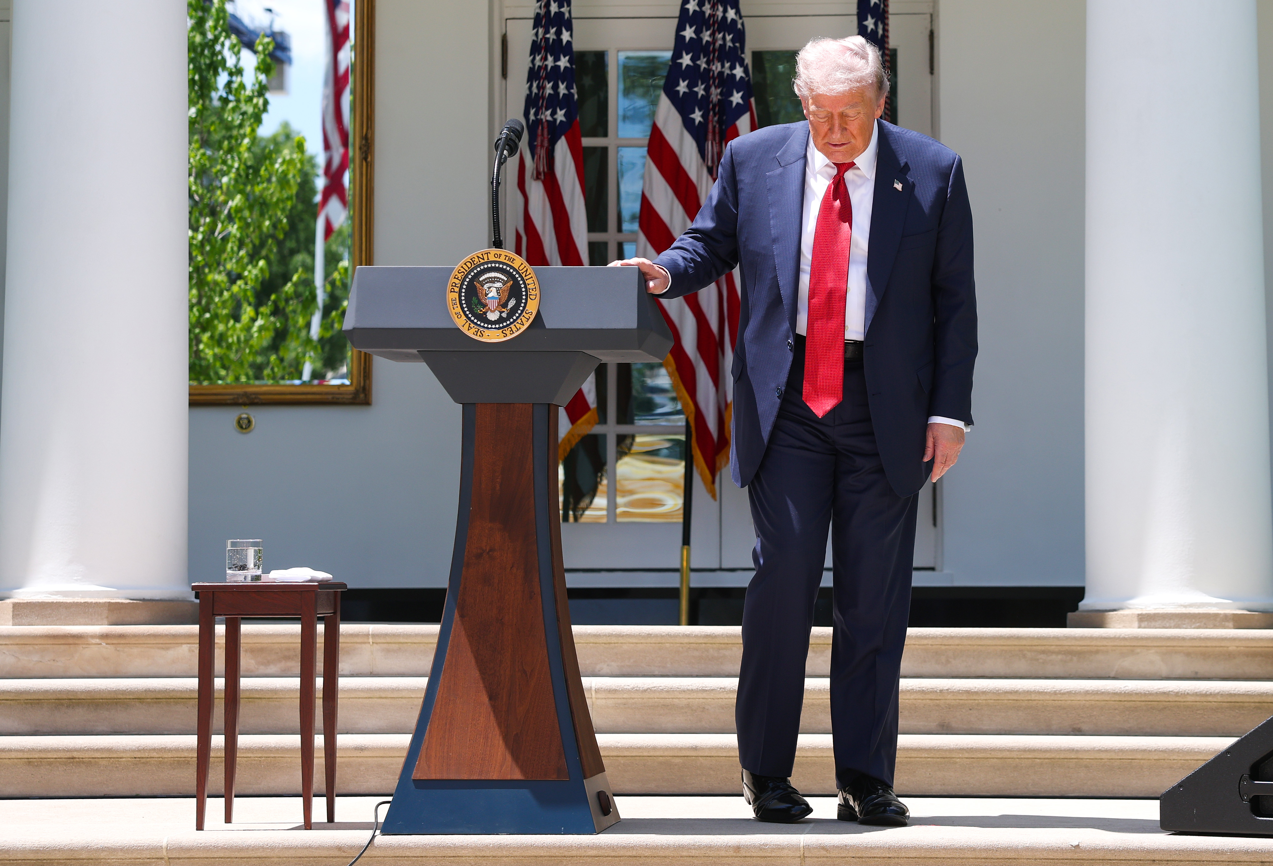President Donald Trump leaves the podium after delivering remarks during a Mother's Day luncheon in the Rose Garden of the White House on May 08, 2026 in Washington, DC | Source: Getty Images
