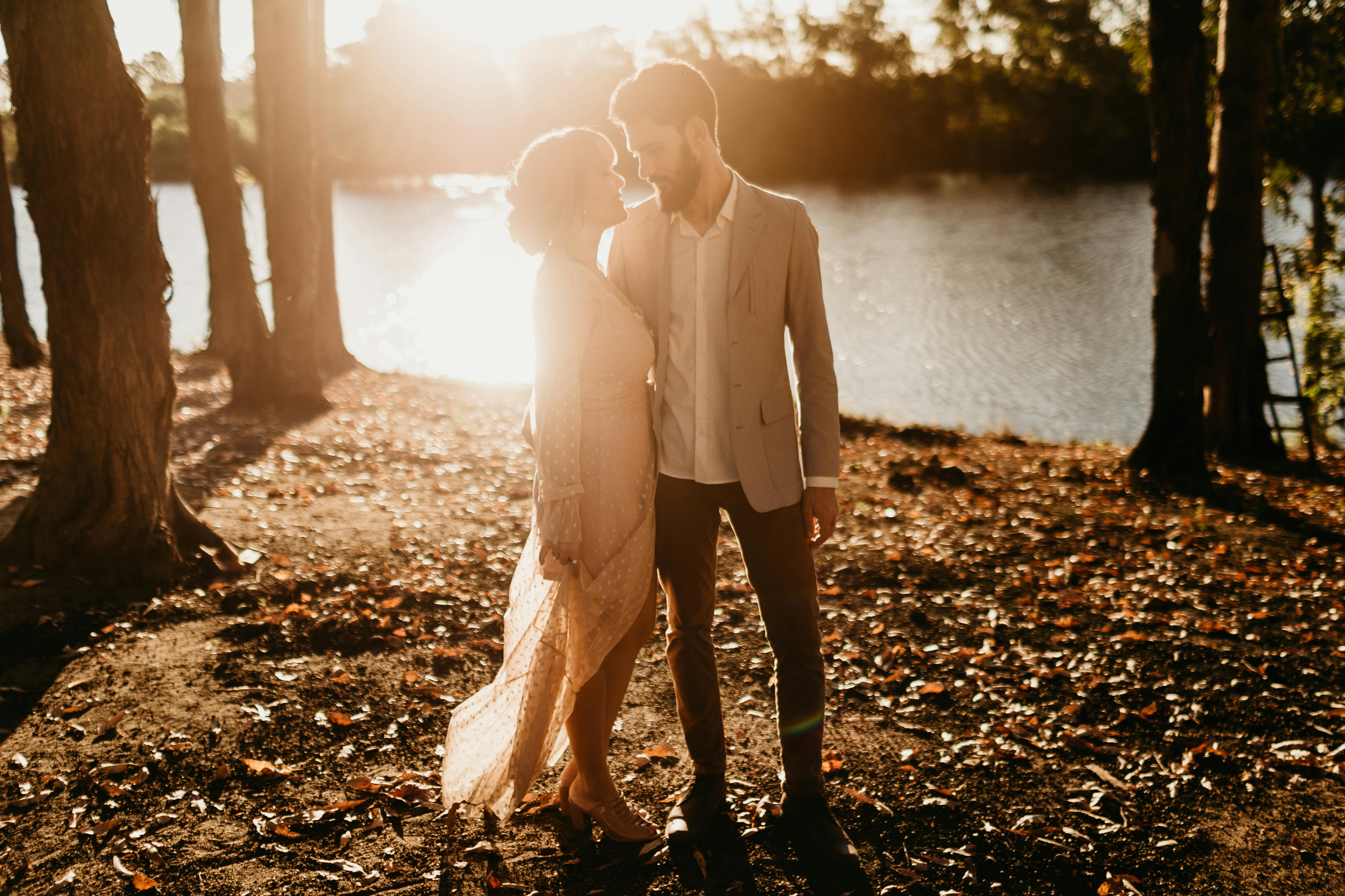 A couple sharing a happy moment at sunset | Source: Pexels