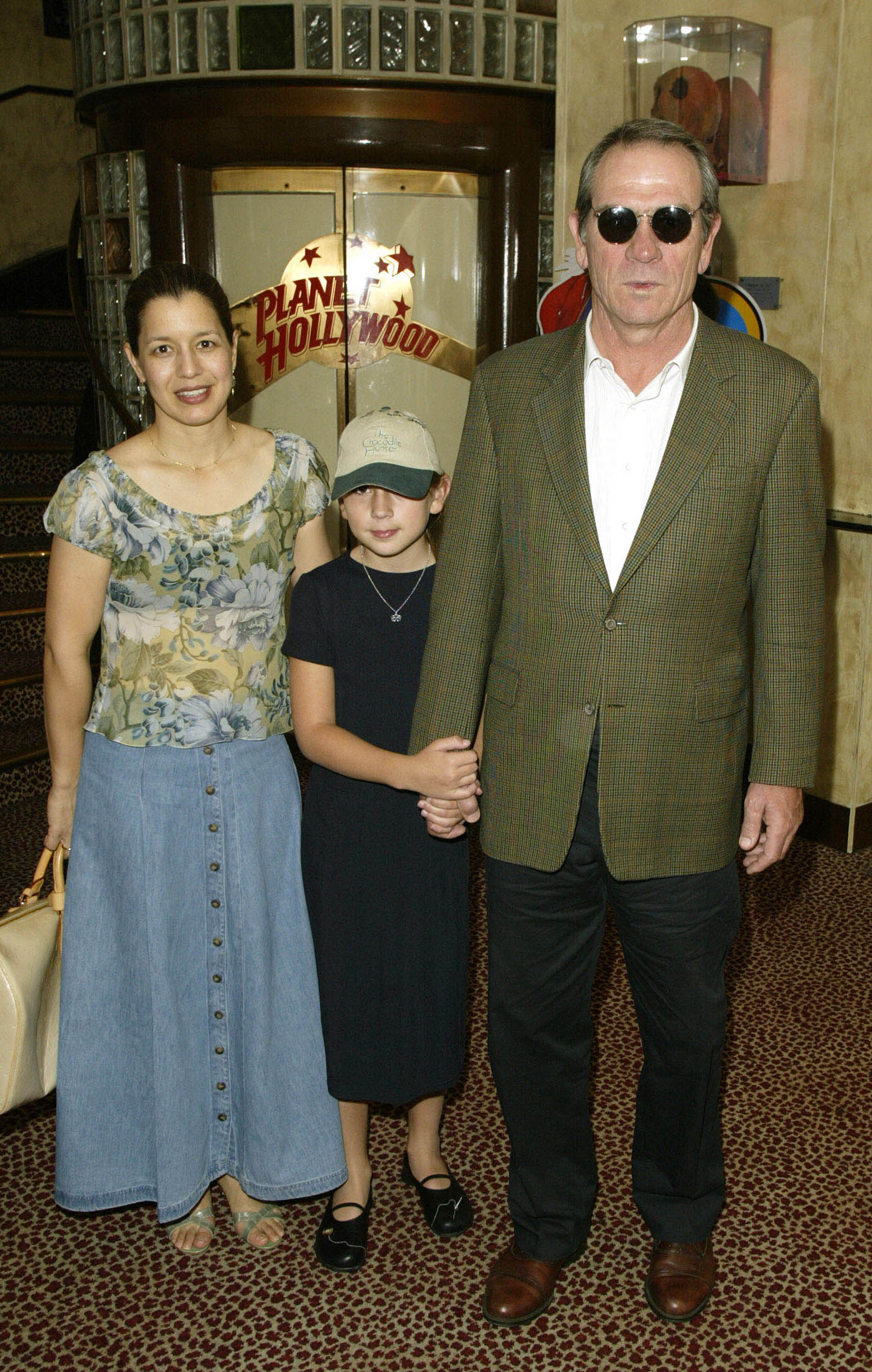 Tommy Lee Jones with his wife and daughter Victoria arrive for the premiere of the film "Stuart Little 2" at Planet Hollywood on July 14, 2002