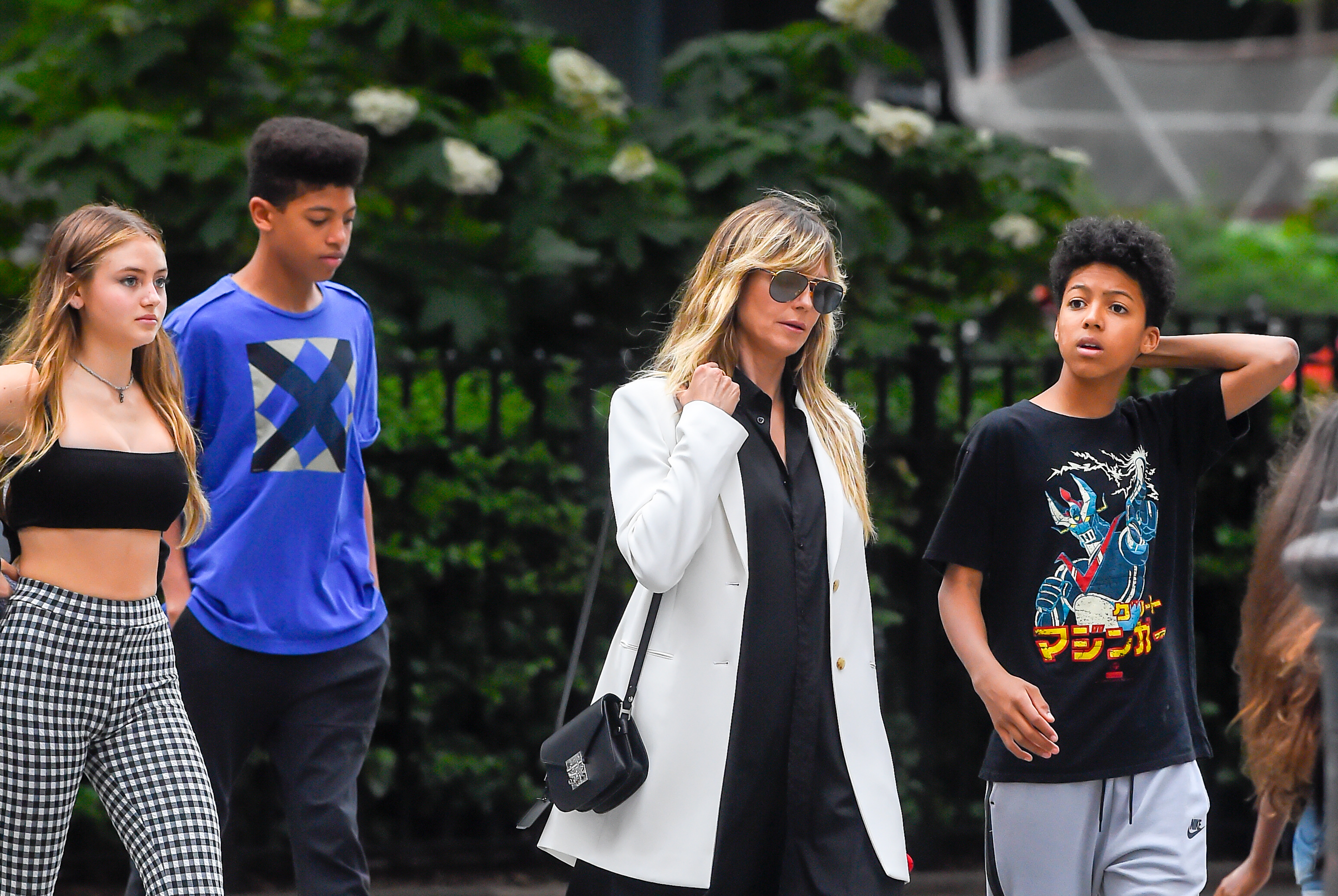 Heidi Klum, Johan and Henry Samuel, and a forth person seen on June 19, 2019, in New York City | Source: Getty Images