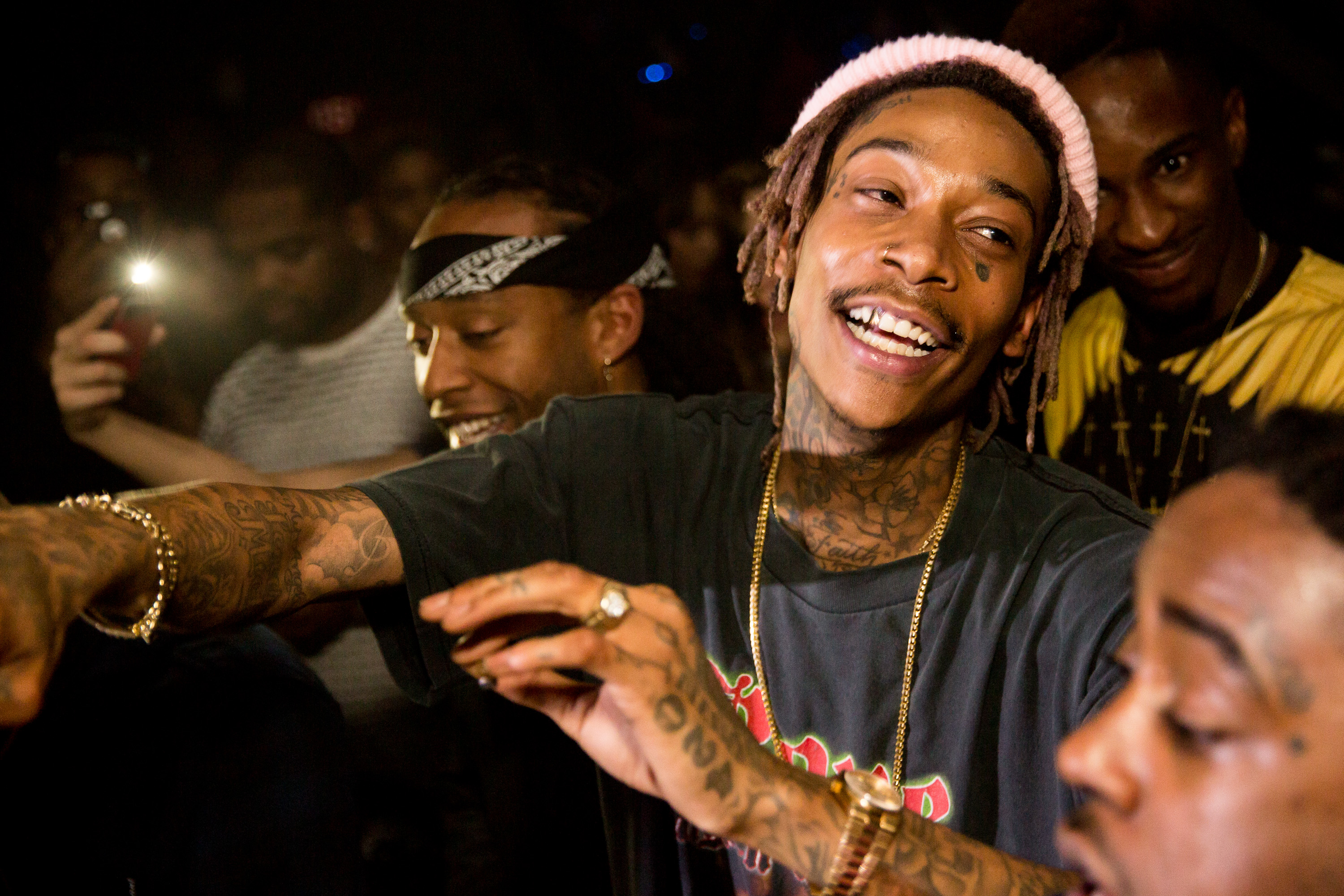 Ty Dolla $ign and Wiz Khalifa during Khalifa's post-Grammy party on February 8, 2015, in Los Angeles, California. | Source: Getty Images