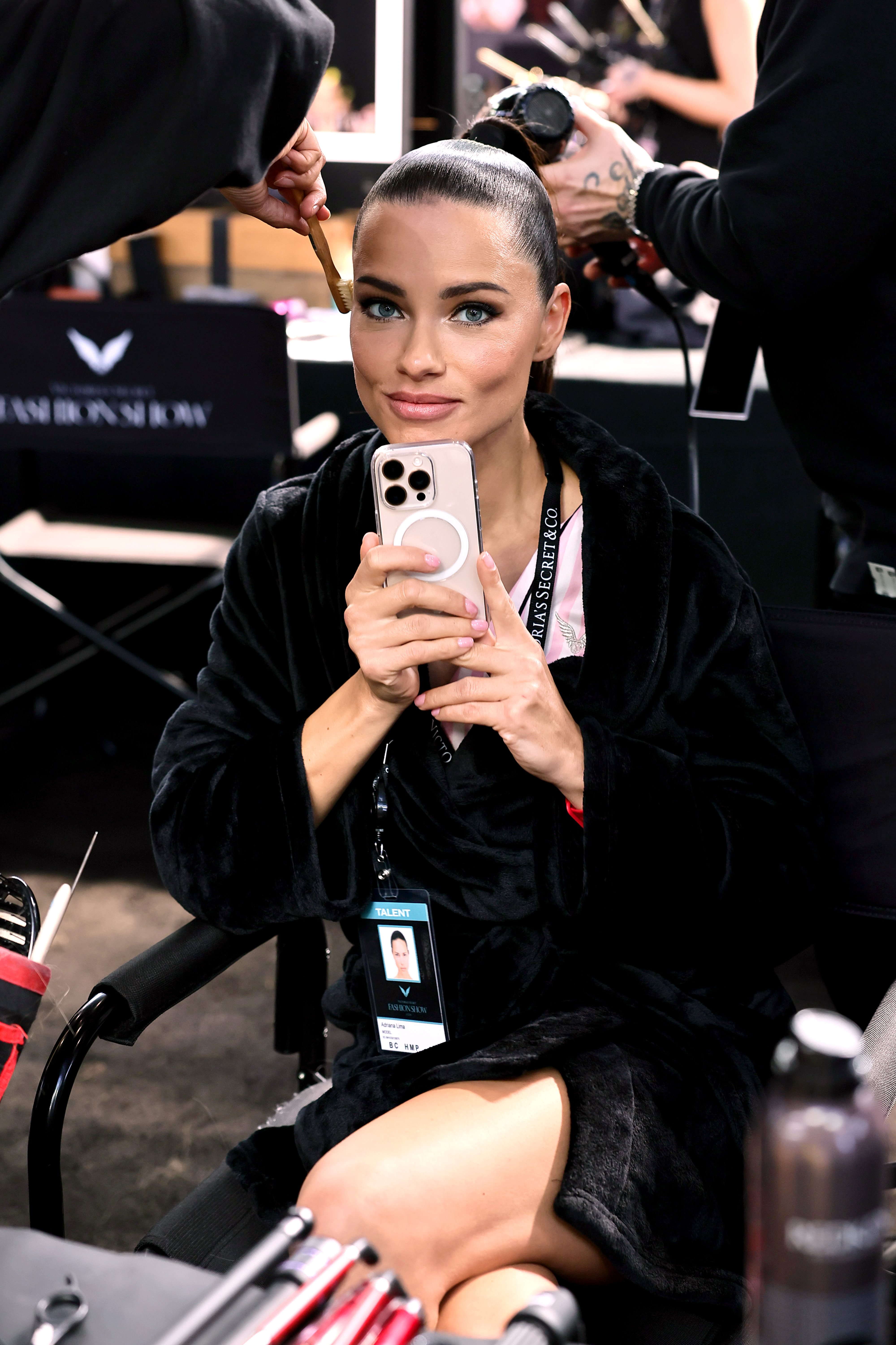 Adriana Lima prepares backstage during the Victoria's Secret Fashion Show 2024 on October 15, 2024 | Source: Getty Images