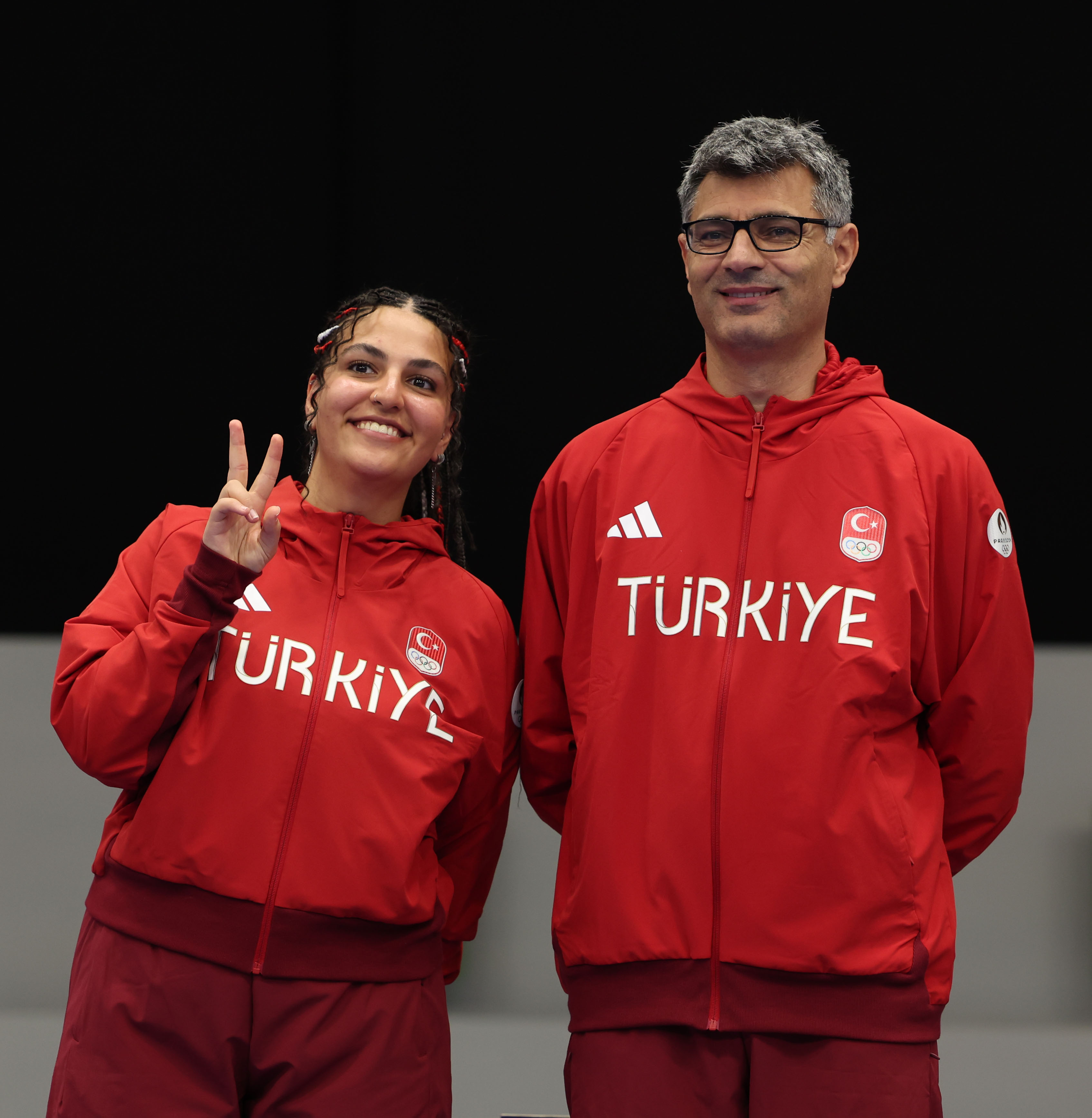 Sevval Ilayda Tarhan and Yusuf Dikeç of Team Turkey pose on the podium during the Shooting 10m Air Pistol Mixed Team medal ceremony at the Paris Olympic Games on July 30, 2024, in Chateauroux, France | Source: Getty Images