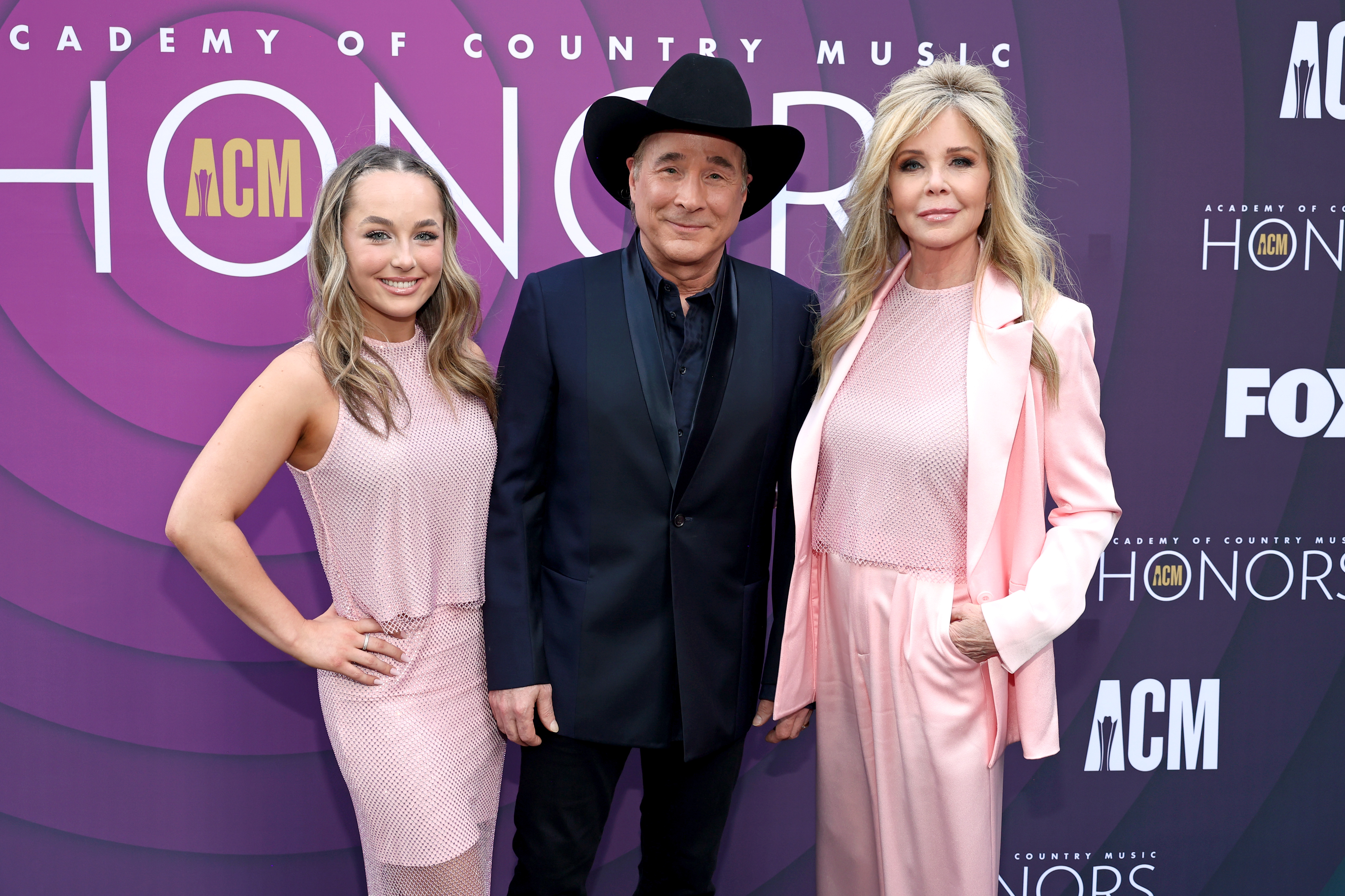 Lily Pearl Black, Clint Black and Lisa Hartman Black at Ryman Auditorium on August 23, 2023, in Nashville, Tennessee. | Source: Getty Images