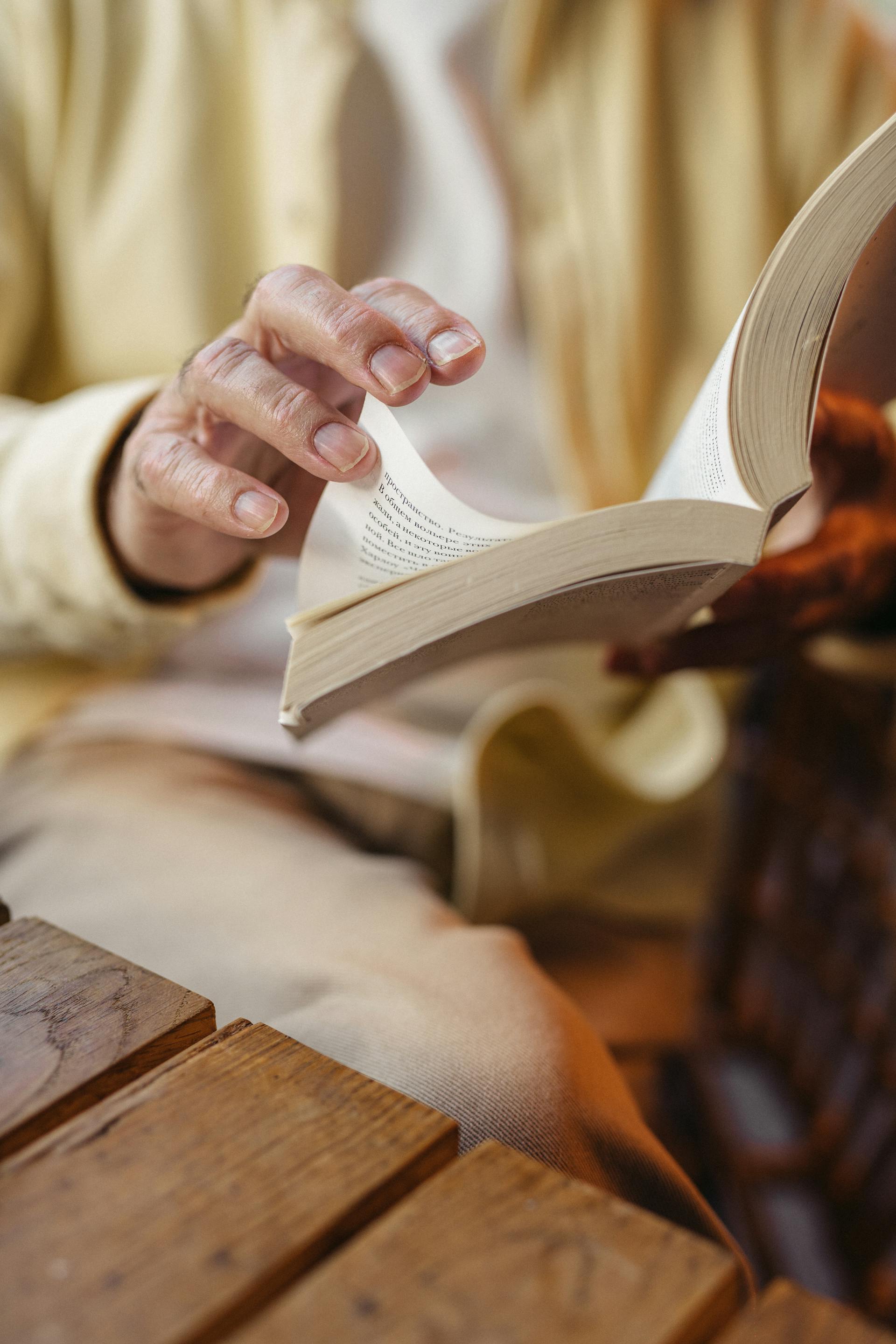 Close-up shot of a woman reading a book | Source: Pexels