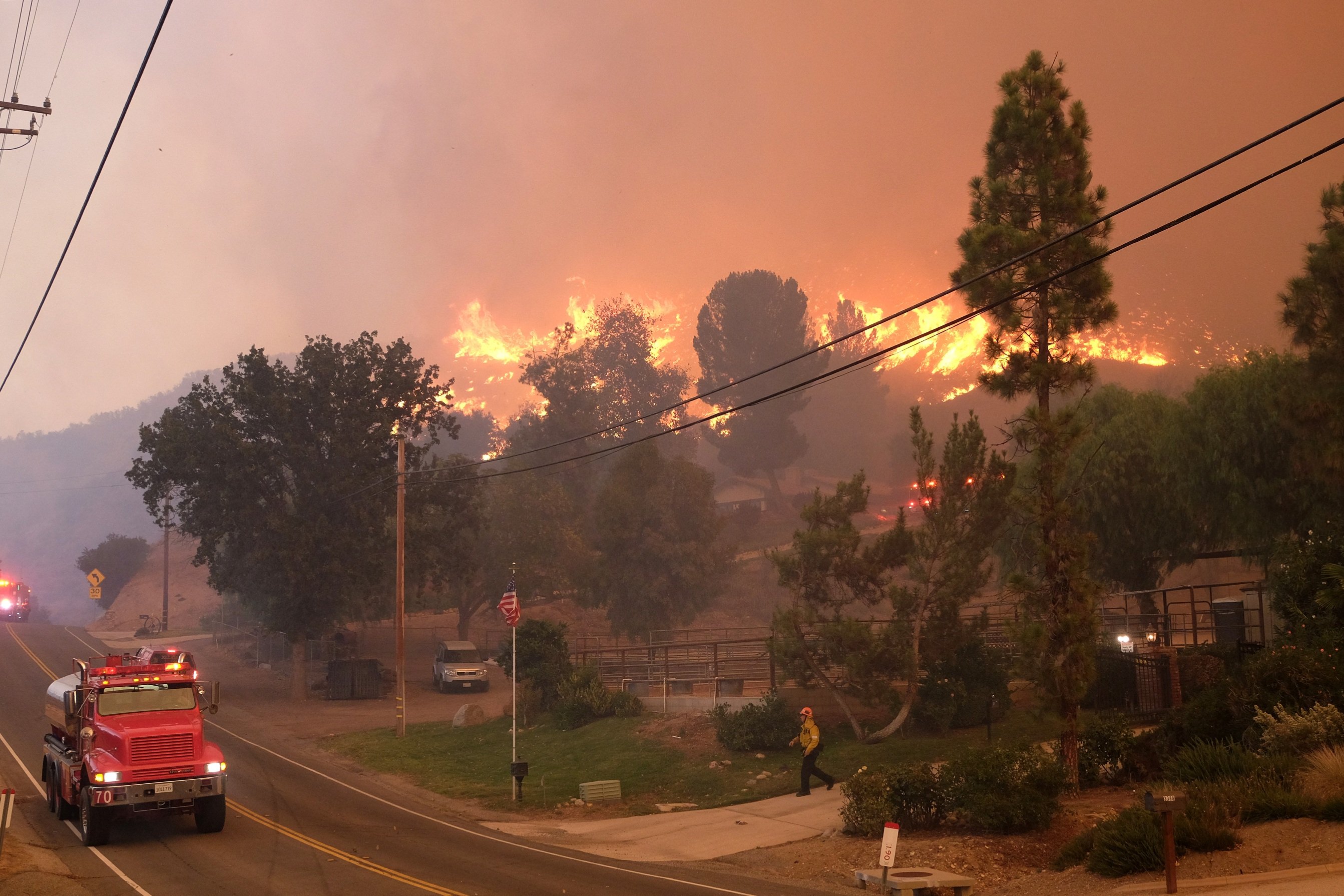 Firefighters  work to protect the property on Cornell Road near Paramount Ranch on November 9, 2018 in Agoura Hills, California. | Source: Getty Images.