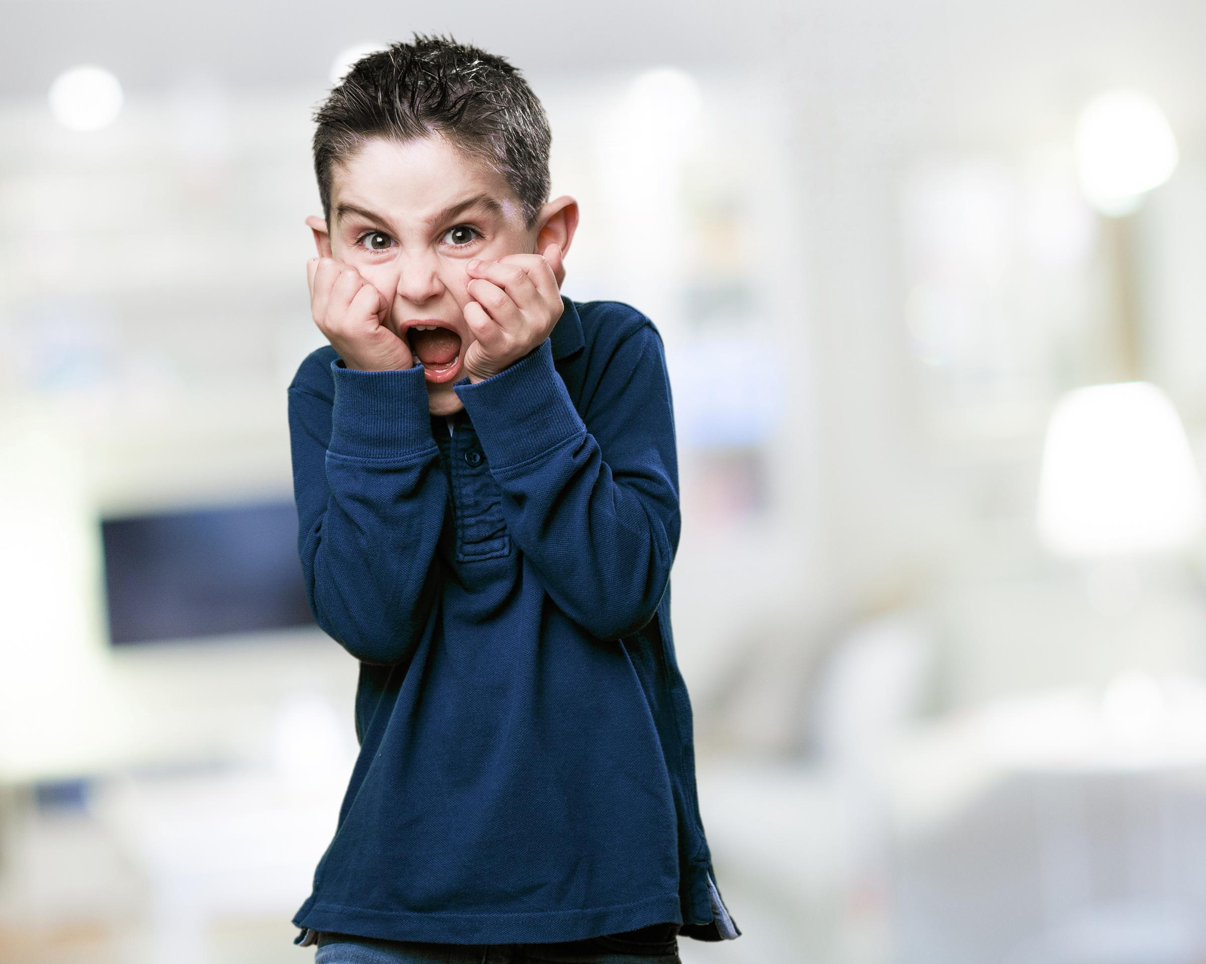 A scared little boy | Source: Freepik