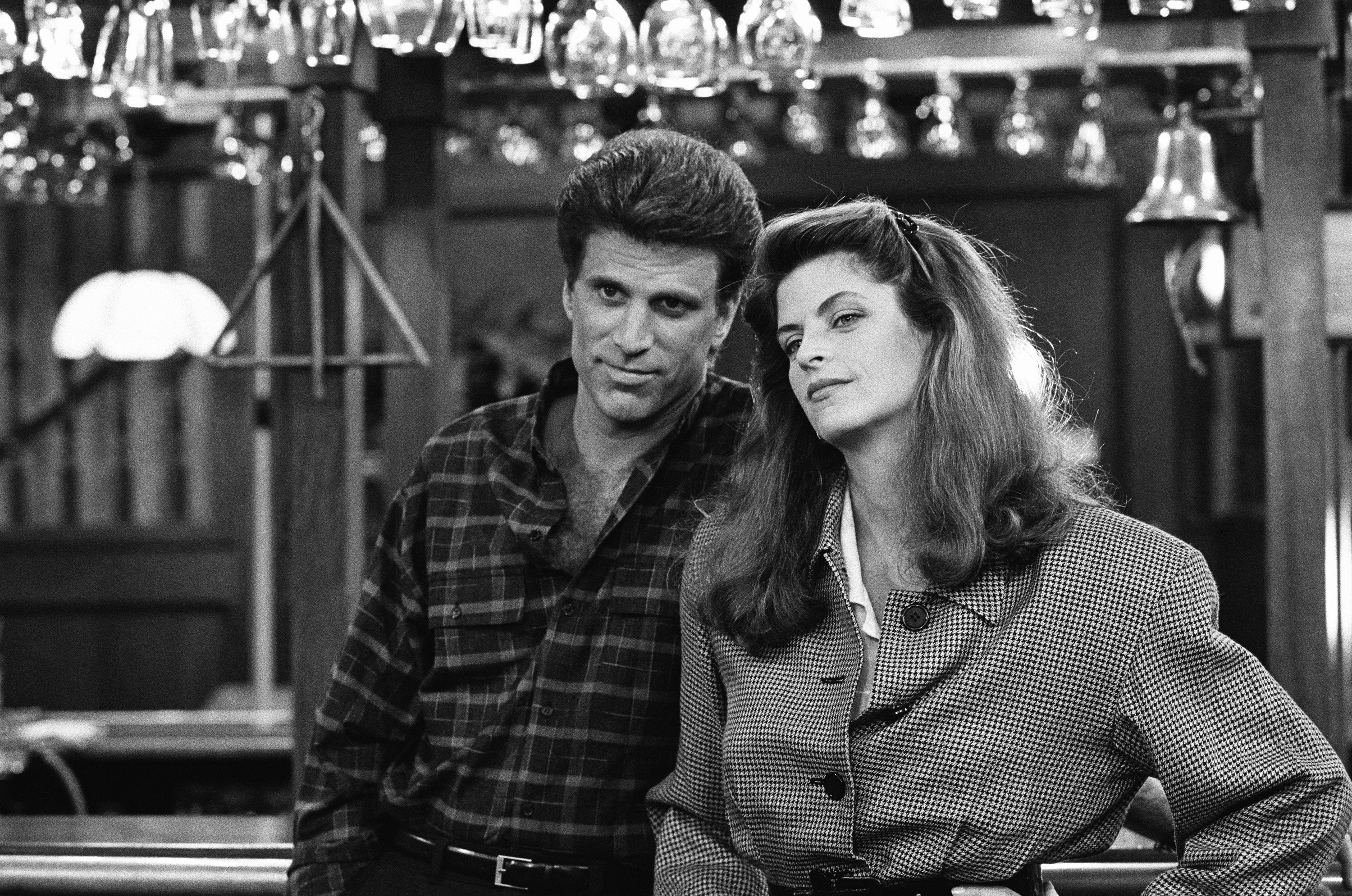 Ted Danson as Sam Malone, Kirstie Alley as Rebecca Howe in "Cheers," 1987. | Source: Getty Images