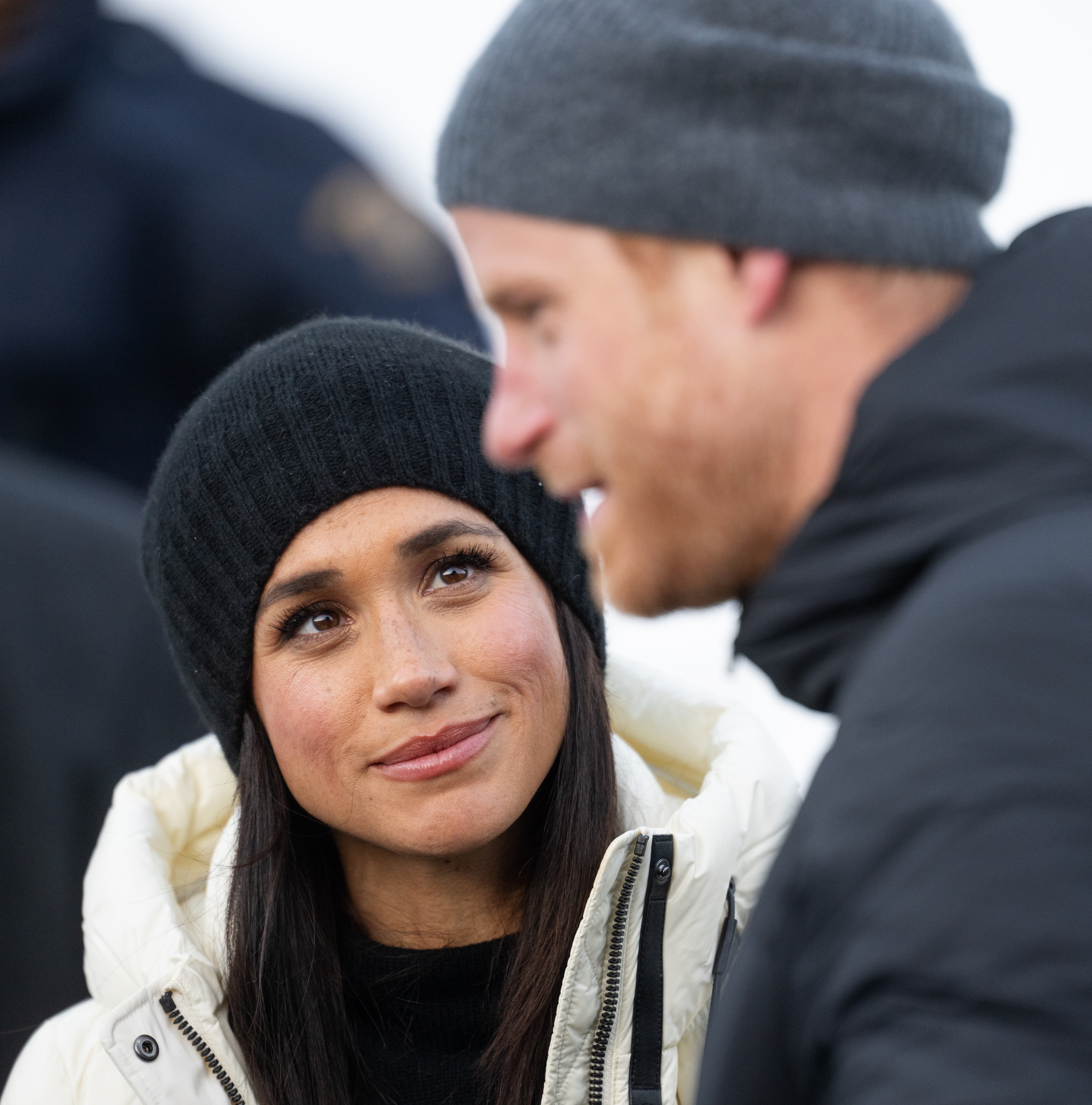 Meghan Markle looking at Prince Harry during the Skeleton Finals of the Invictus Games. | Source: Getty Images