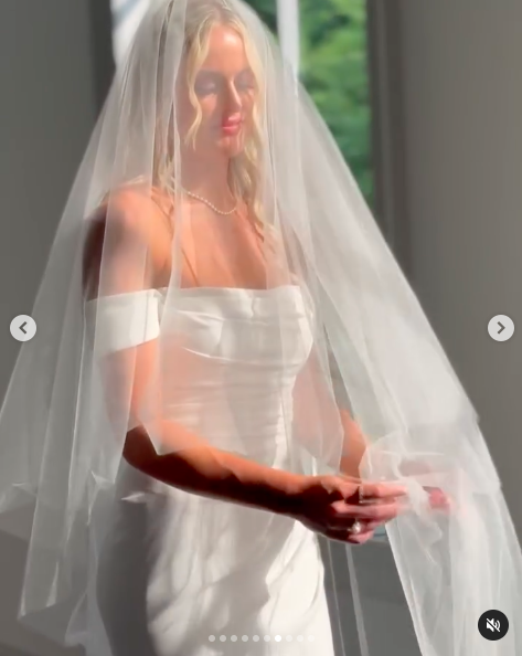 Victoria Schultz posing for a picture in her wedding gown, posted on July 26, 2024 | Source: Instagram/antpagephoto and alenkafilms