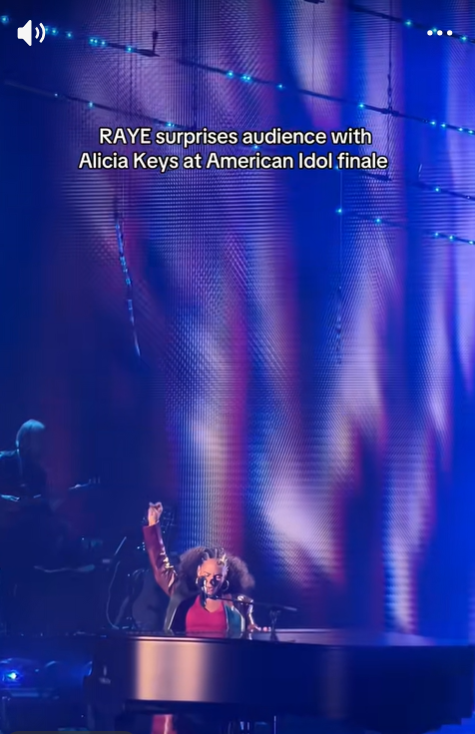 Alicia Keys performs at the 2026 “American Idol” finale as colorful blue and purple stage lights illuminate the arena. | Source: TikTok/gabiwhiting
