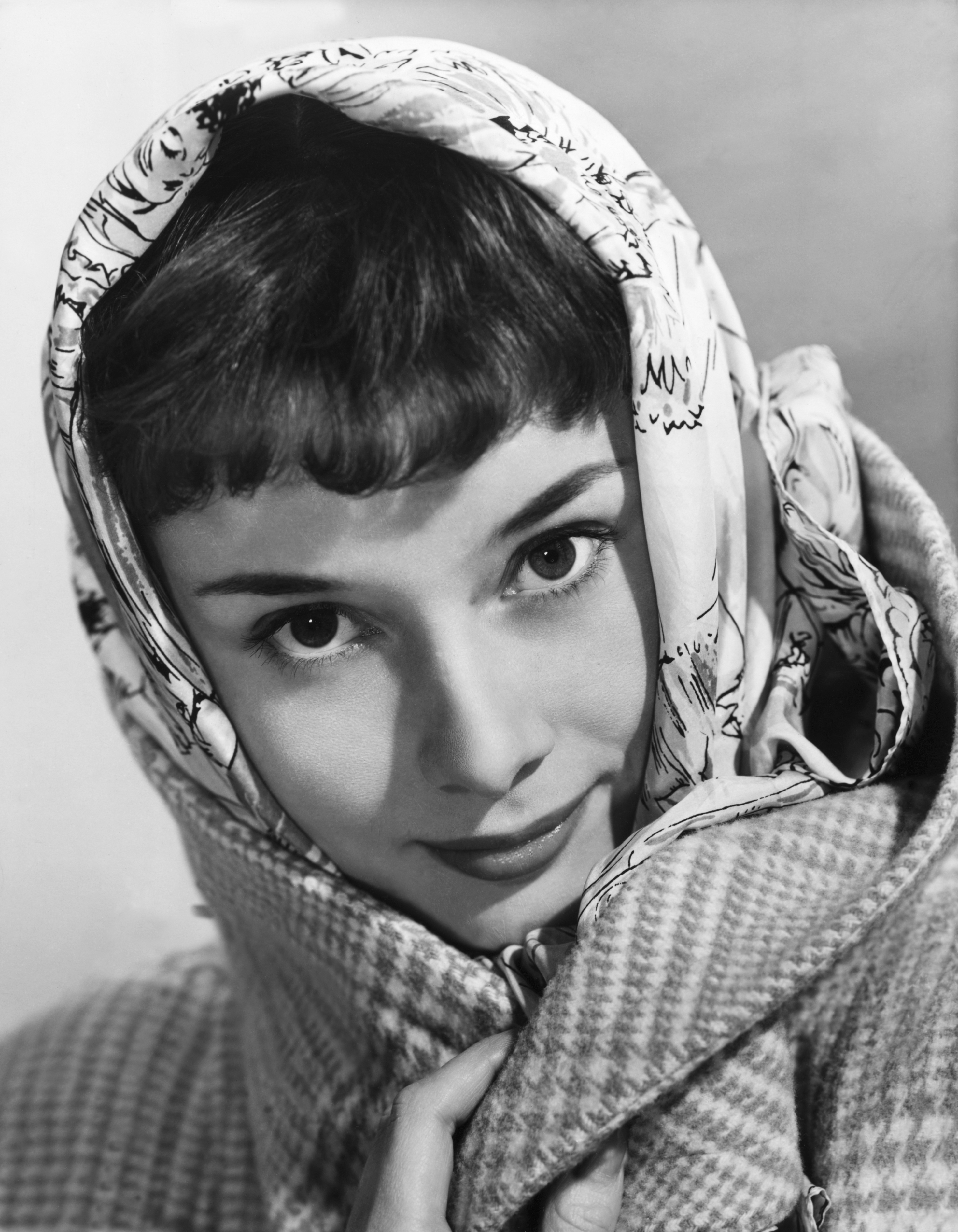 Audrey Hepburn undated photo wearing a coat and scarf | Source: Getty Images