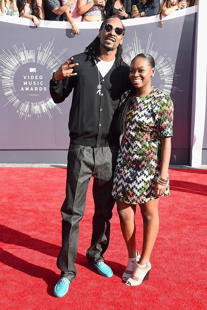Snoop Dogg and Cori Broadus attend the 2014 MTV Video Music Awards at The Forum on August 24, 2014. | Source: Getty Images