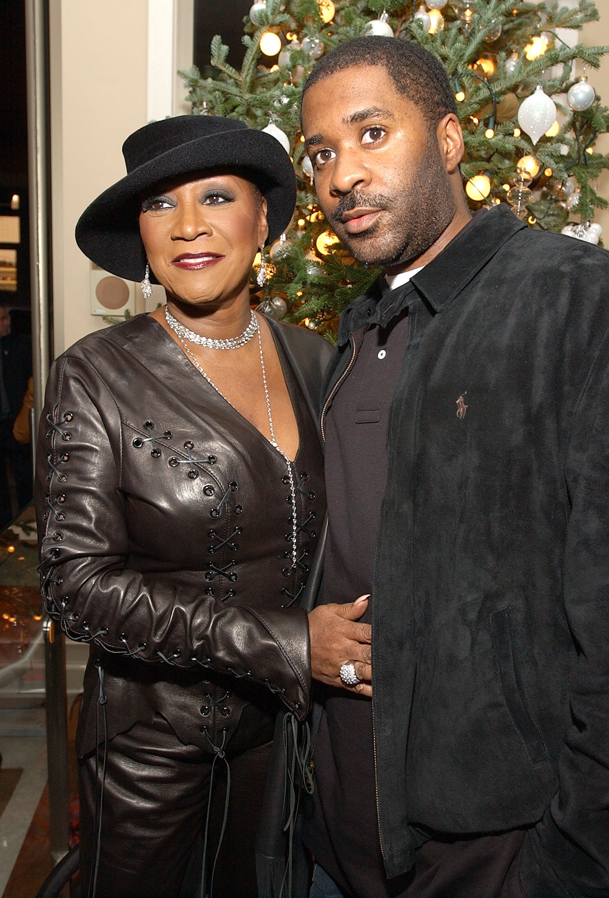 Patti LaBelle and Zuri Kye Edwards pose at Lloyd Boston's Book Launch Party for "Make Over Your Man: A Woman's Guide to Dressing Any Man in Her Life" on unspecified date and location | Source: Getty Images