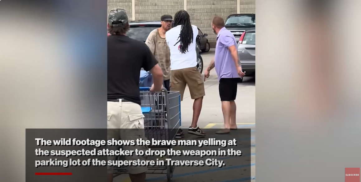 Heroic men confront the alleged stabber telling him to put the weapon "on the ground," from a video posted on July 27, 2025 | Source: YouTube/NewYorkPost