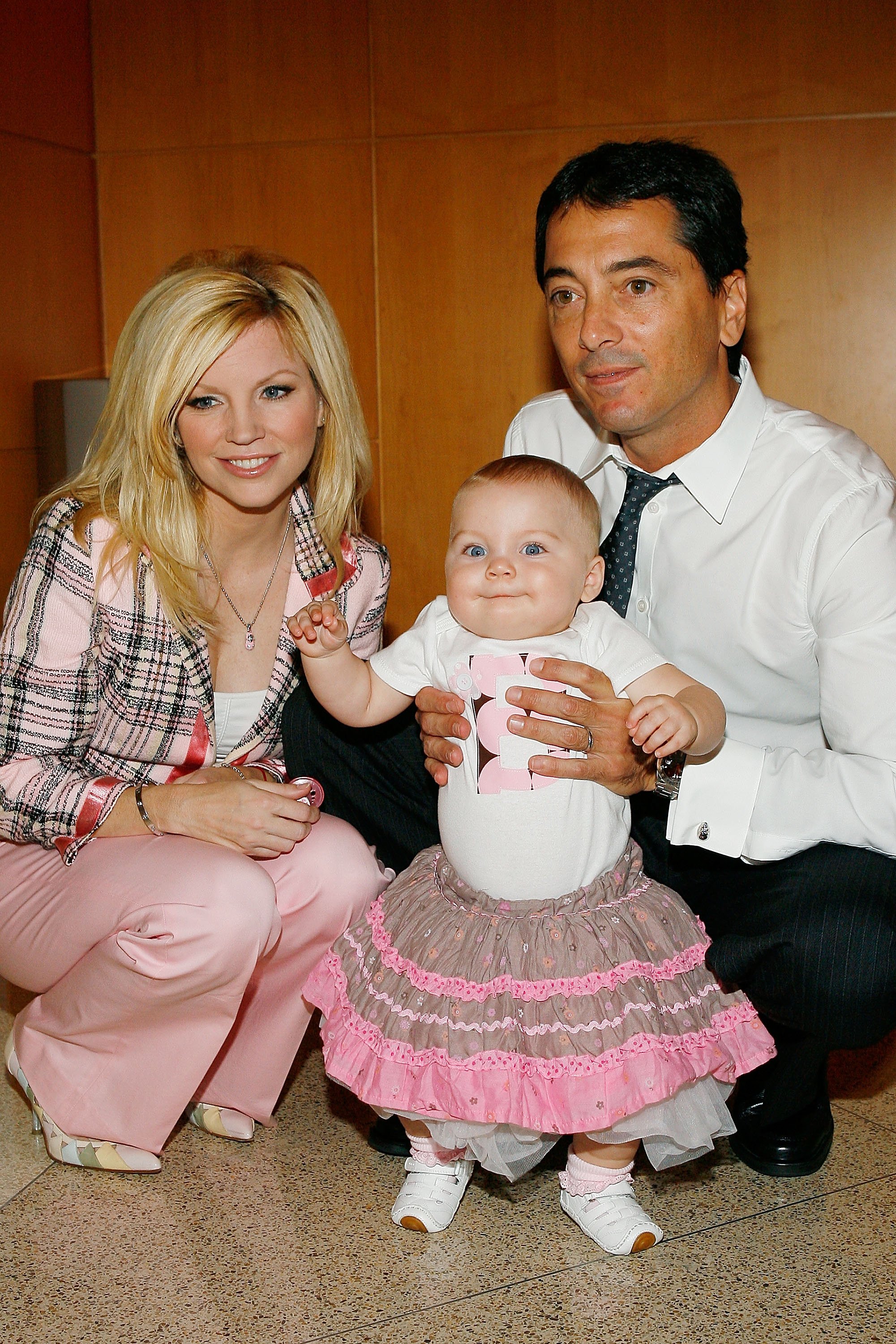 Scott Baio and Renee Baio pose with their daughter Bailey at a press conference to kickoff the National Newborn Screening Awareness Month on September 5, 2008 at the Mattell Children's Hospital UCLA in Westwood, California | Source: Getty Images 