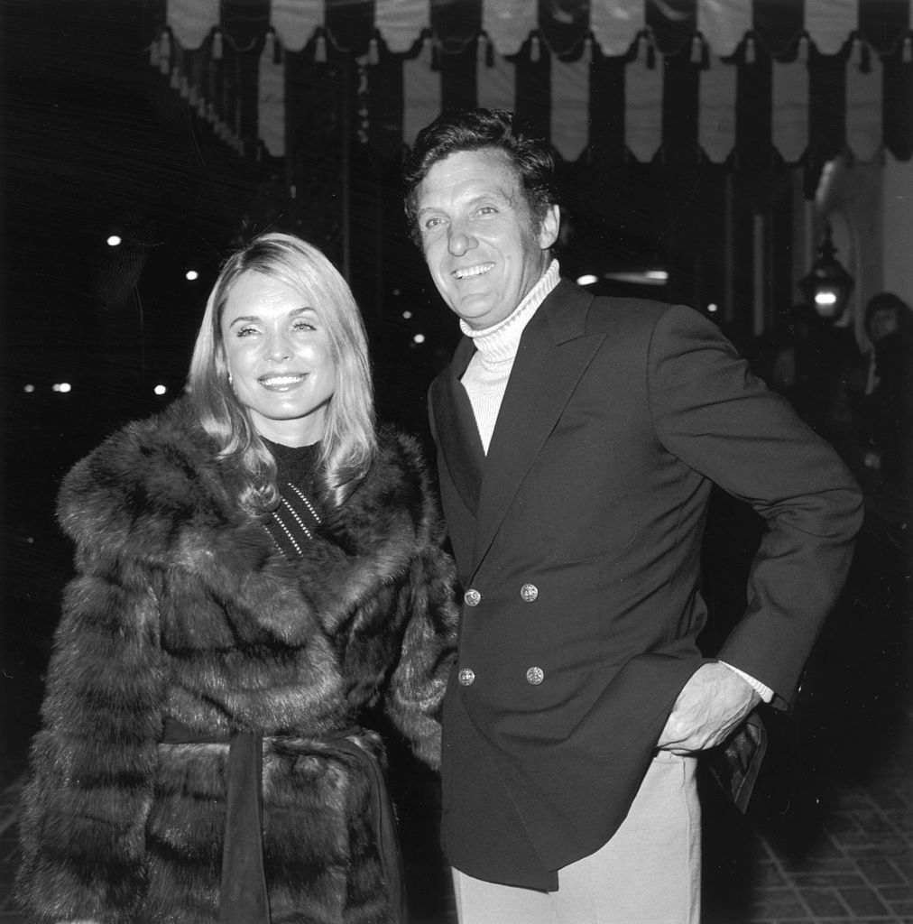 Married actors Robert Stack (1919 - 2003) and Rosemarie Bowe at a party for French skier and actor Jean-Claude Killy at Chasen's restaurant, Los Angeles in February 1972 | Photo: Getty Images