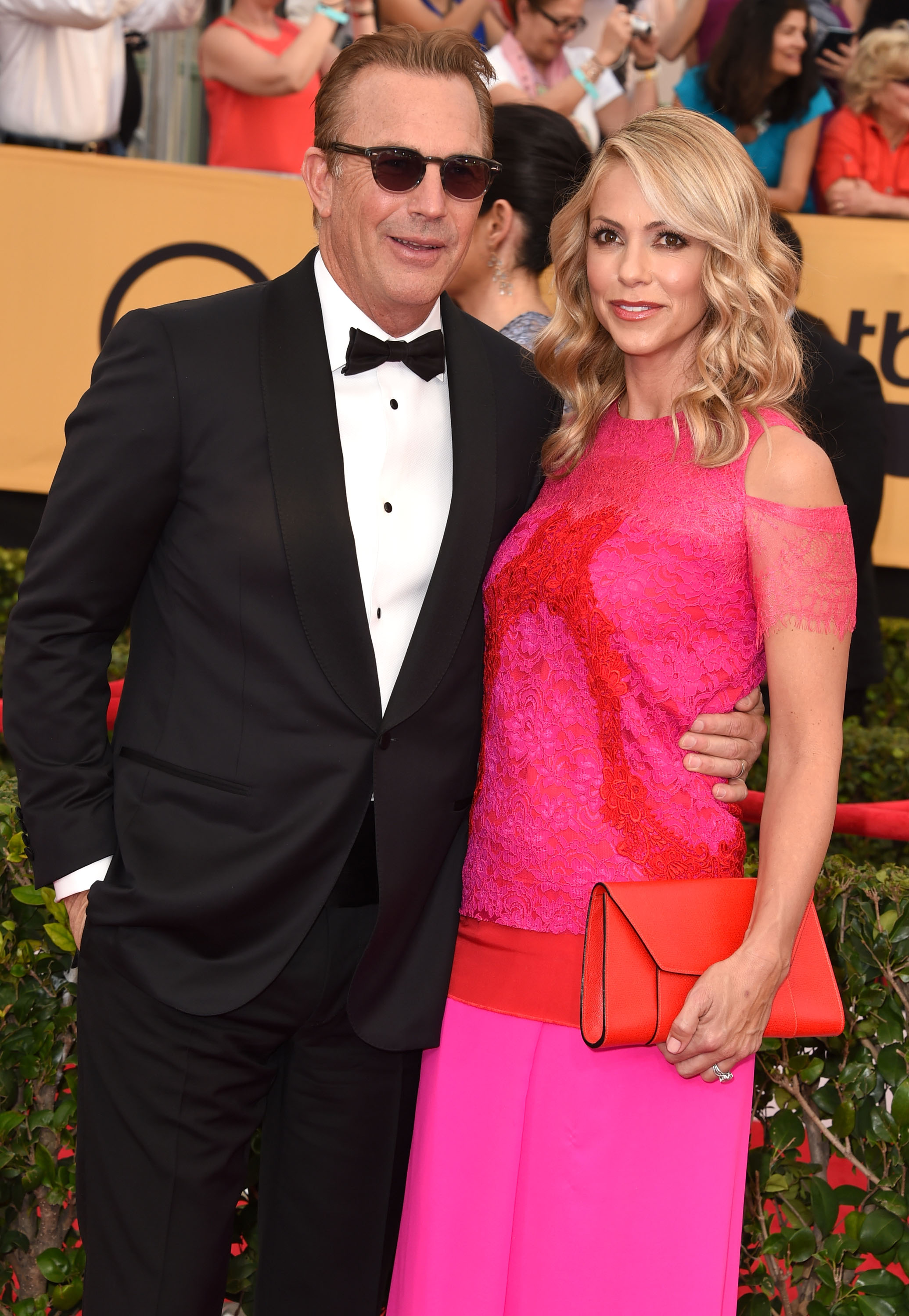Kevin Costner and Christine Baumgartner at the 21st Annual Screen Actors Guild Awards in Los Angeles, California, on January 25, 2015. | Source: Getty Images