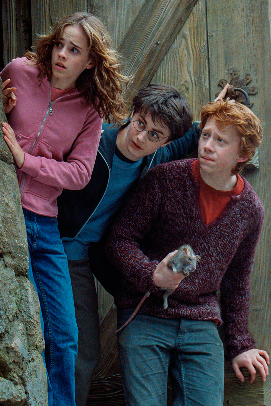 Emma Watson, Daniel Radcliffe, and Rupert Grint on the set of "Harry Potter and the Prisoner of Azkaban," in London, England, in 2003 | Source: Getty Images