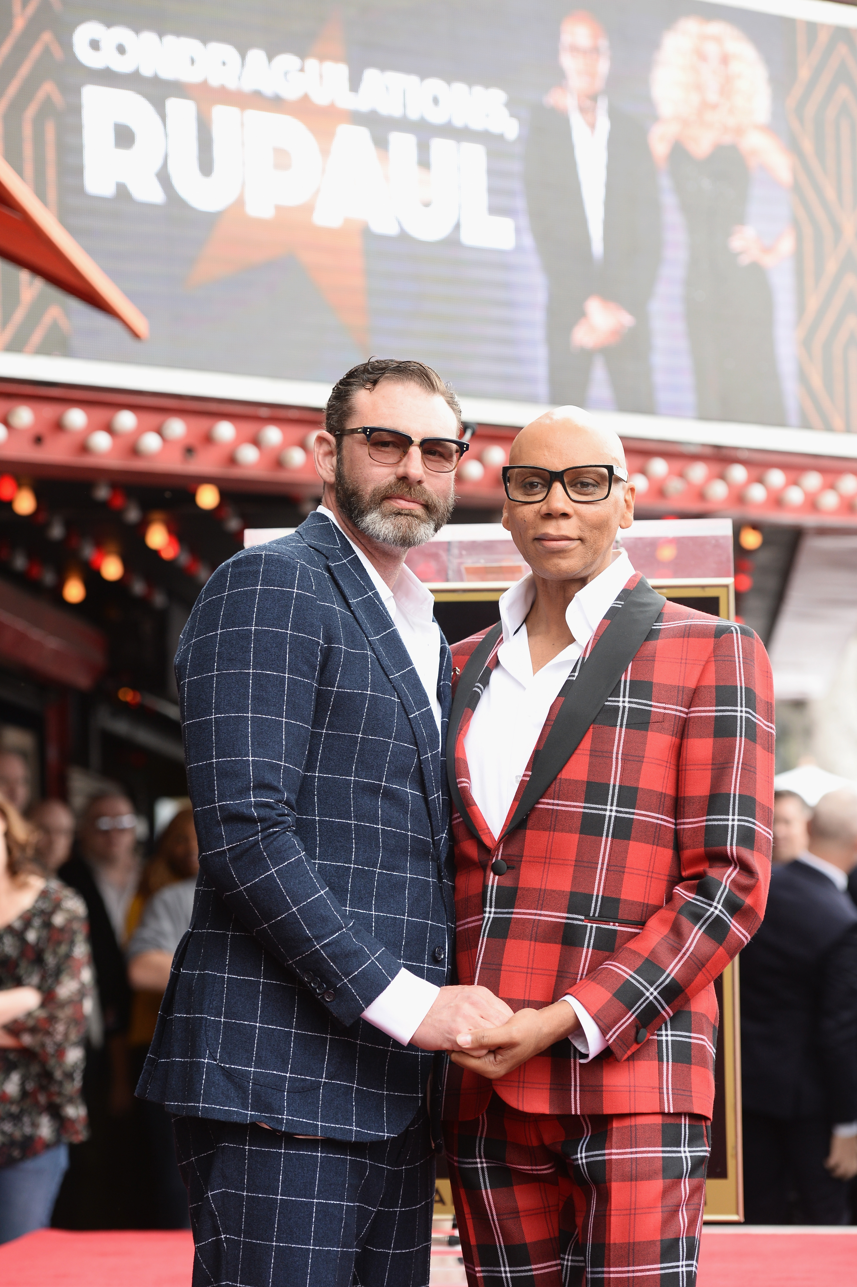 Drag queen RuPaul (R) and his husband Georges LeBar attend RuPaul's star ceremony on The Hollywood Walk of Fame on March 16, 2018 in Hollywood, California | Source: Getty Images