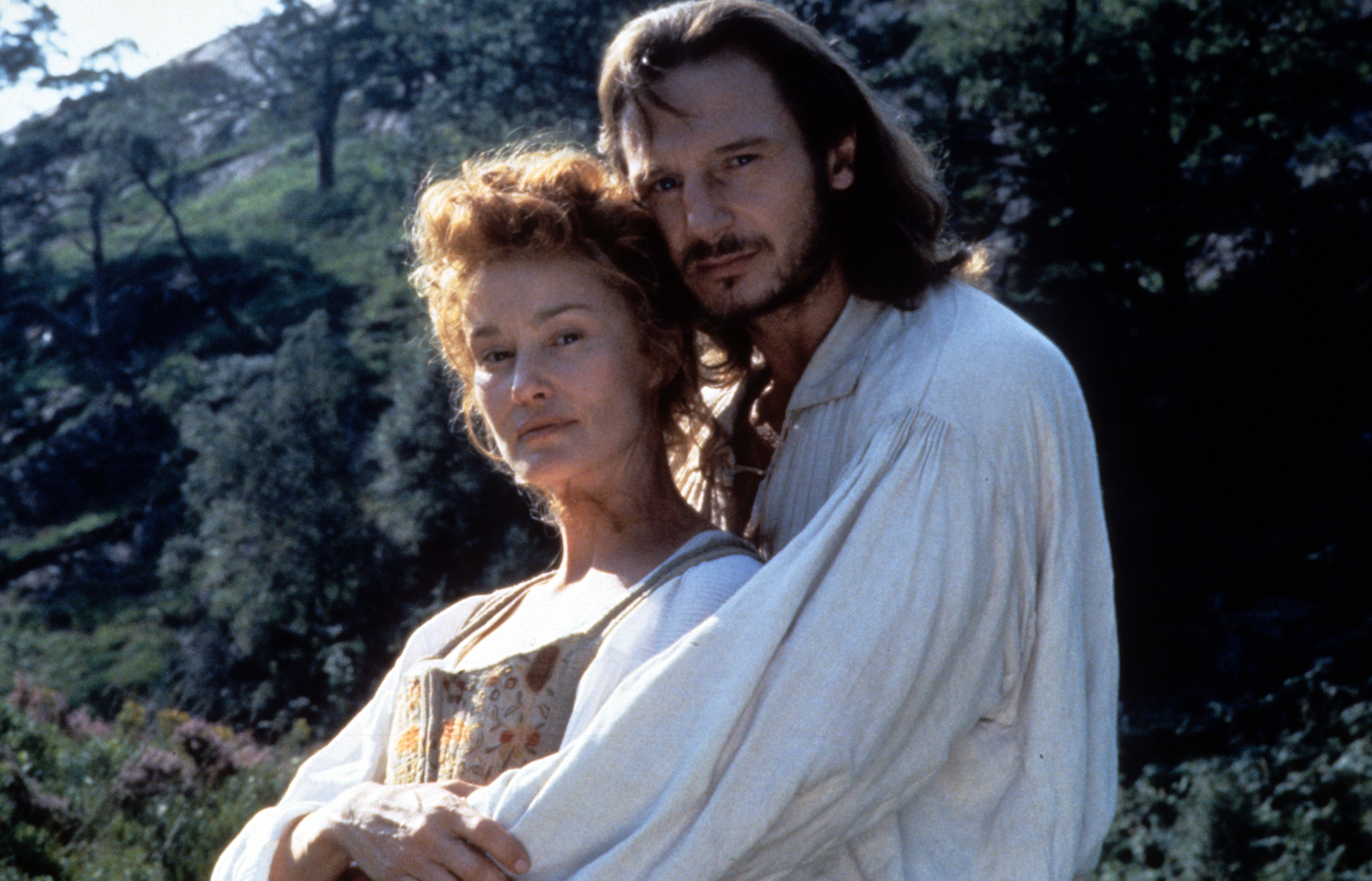 Jessica Lange is held by Liam Neeson on set of the film "Rob Roy'" in 1995 | Source: Getty Images