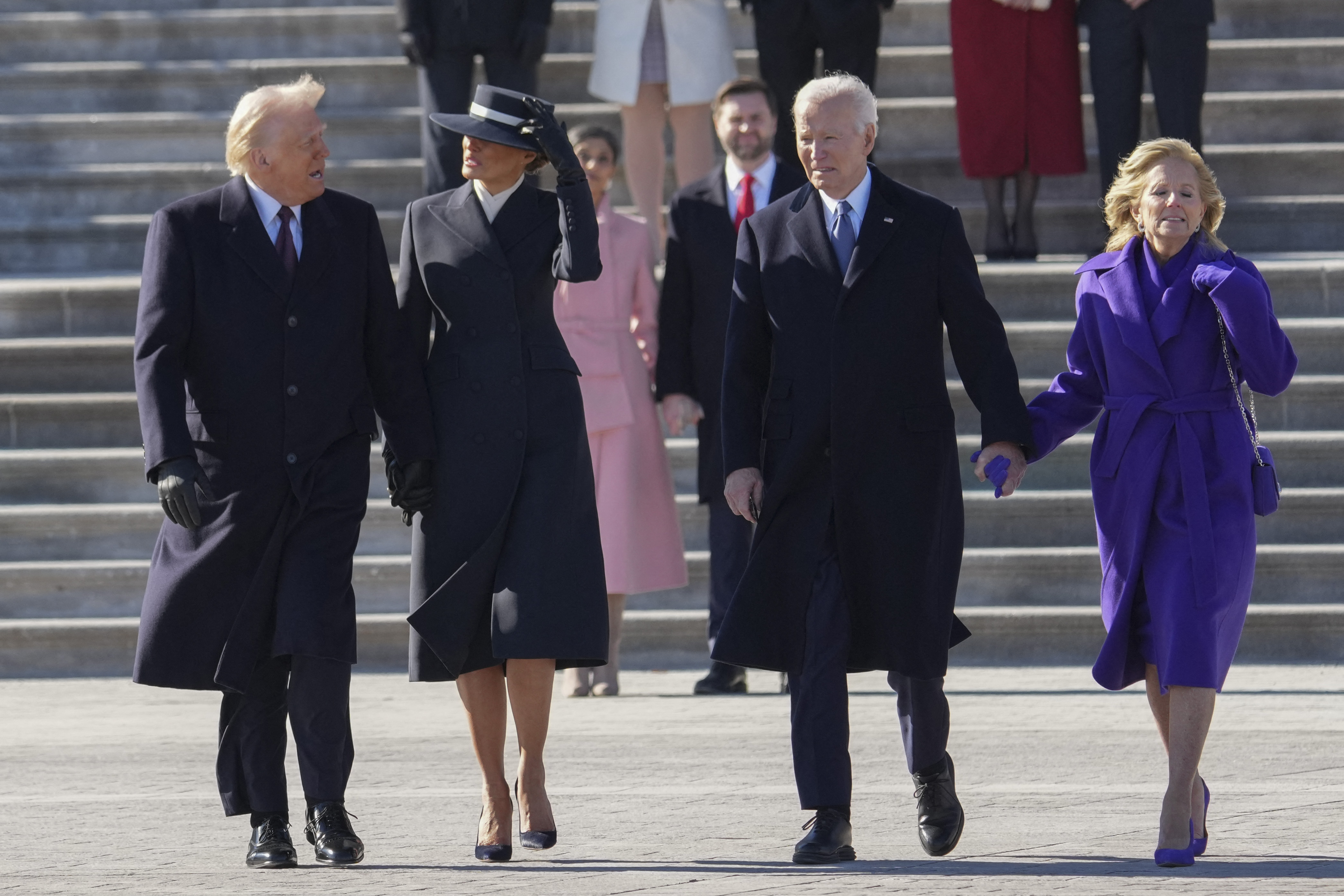 US President Donald Trump, US First Lady Melania Trump, former US President Joe Biden, and former US First Lady Dr. Jill Biden during a departure ceremony in Washington, D.C., on January 20, 2025. | Source: Getty Images