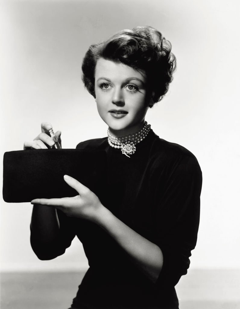 Angela Lansbury posing for a perfume commercial in the 1940s. | Source: Getty Images 
