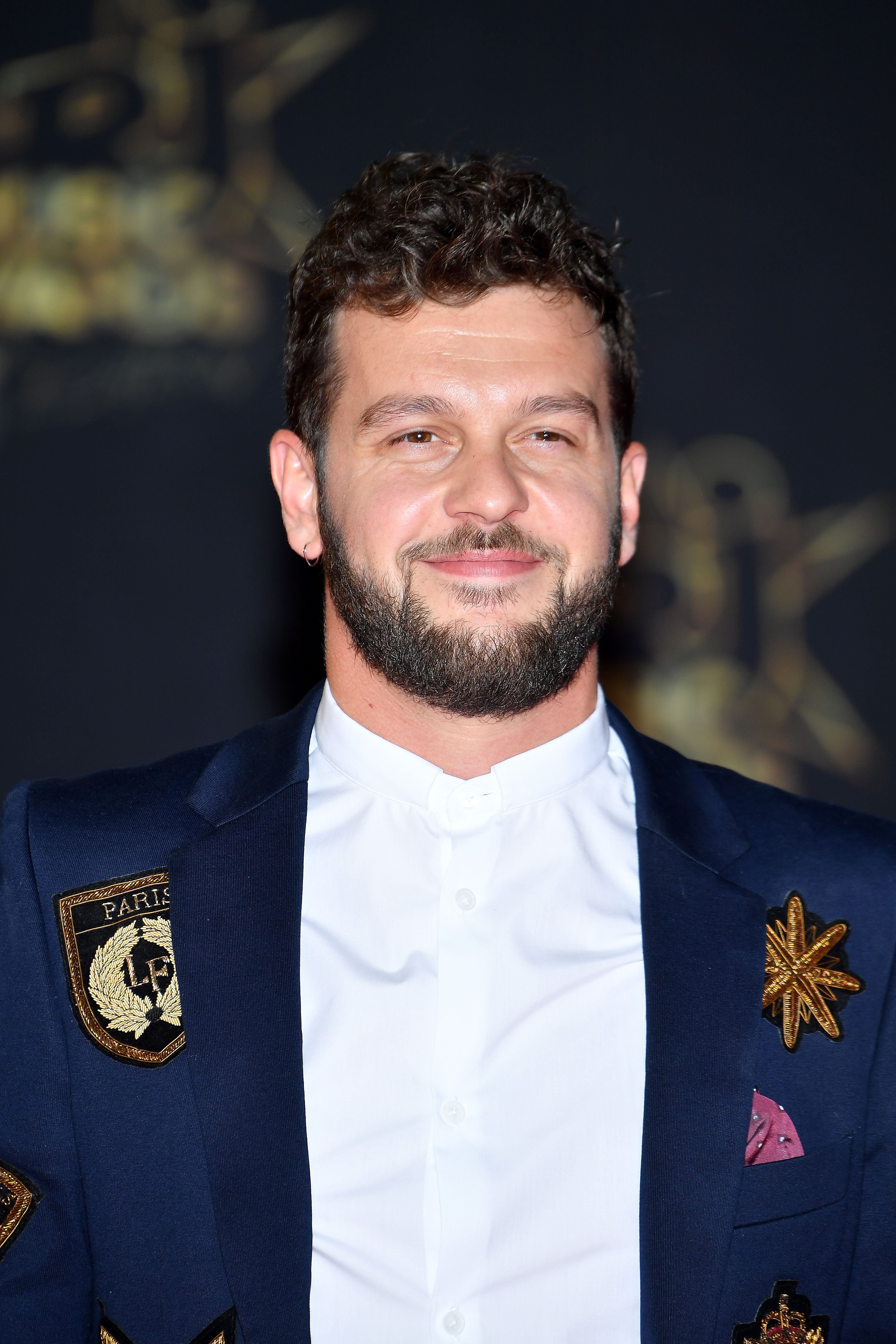 Claudio Capéo arrive à la 20e NRJ Music Awards au Palais des Festivals le 10 novembre 2018 à Cannes, France. | Photo : Getty Images