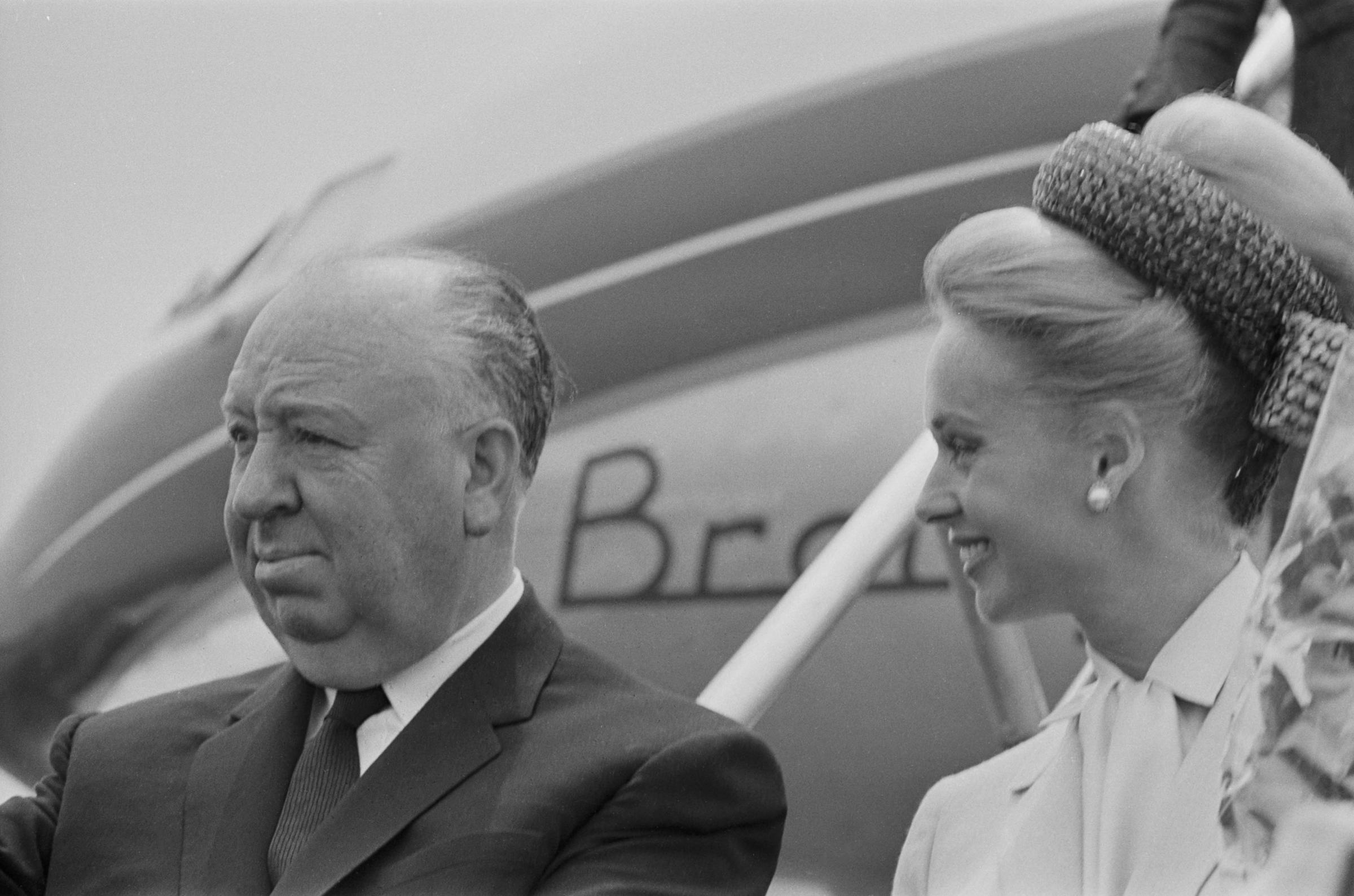 Alfred Hitchcock and Tippi Hedren at Nice airport for the Cannes Film Festival, France, on May 11, 1963. | Source: Getty Images