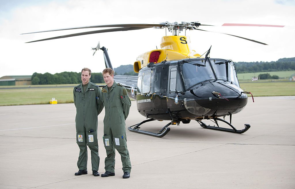 Prince William and Prince Harry attend a photocall during their training at Raf Shawbury, Nr Shrewsbury | Photo: Getty Images