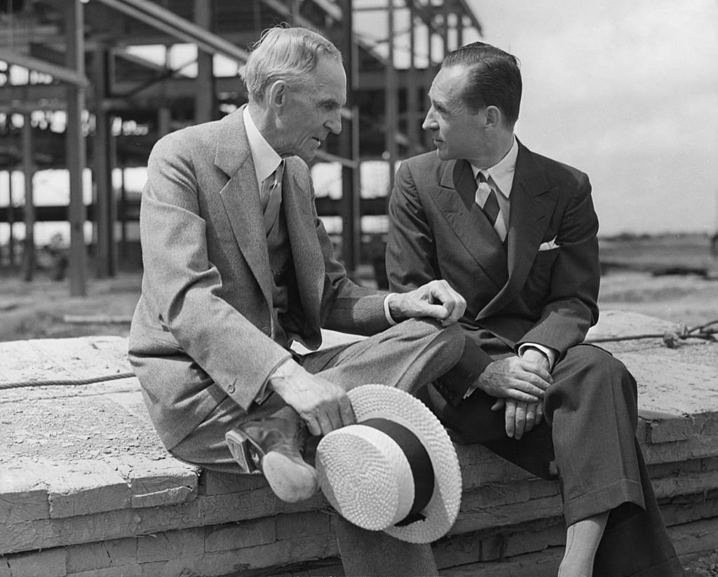 American motor manufacturer Henry Ford with his son Edsel, circa 1940 | Photo: Getty Images