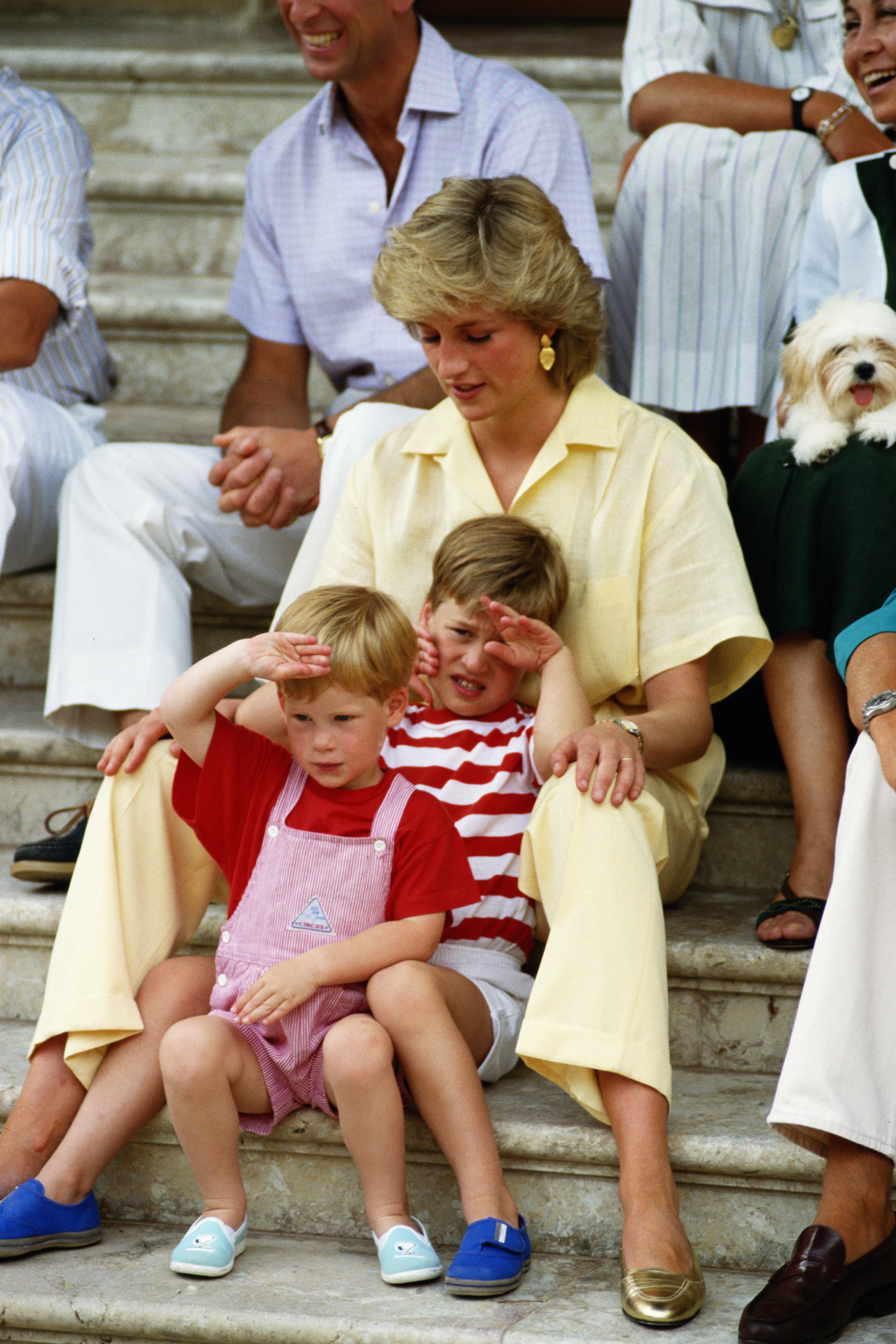 Diana, Princess of Wales photographed with her children Prince Harry and Prince William on holiday at Marivent Palace in August 1987 in Majorca. | Source: Getty Images