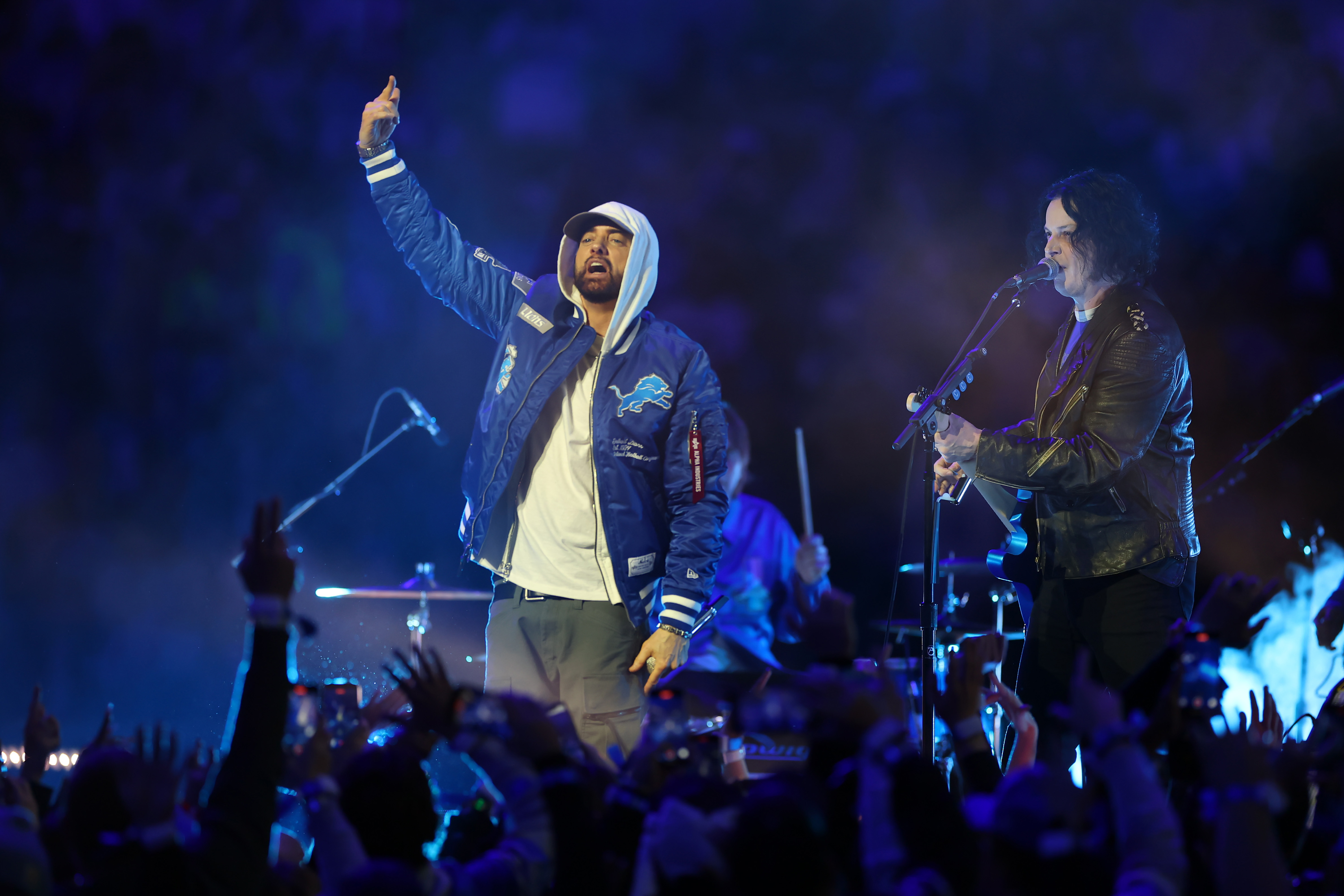 Jack White and Eminem perform during the halftime show of the game between the Green Bay Packers and the Detroit Lions on November 27, 2025 | Source: Getty Images