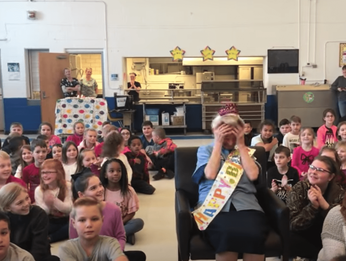 Students celebrate their janitor on her 77th birthday | Source: Youtube/Charleston Gazette-Mail