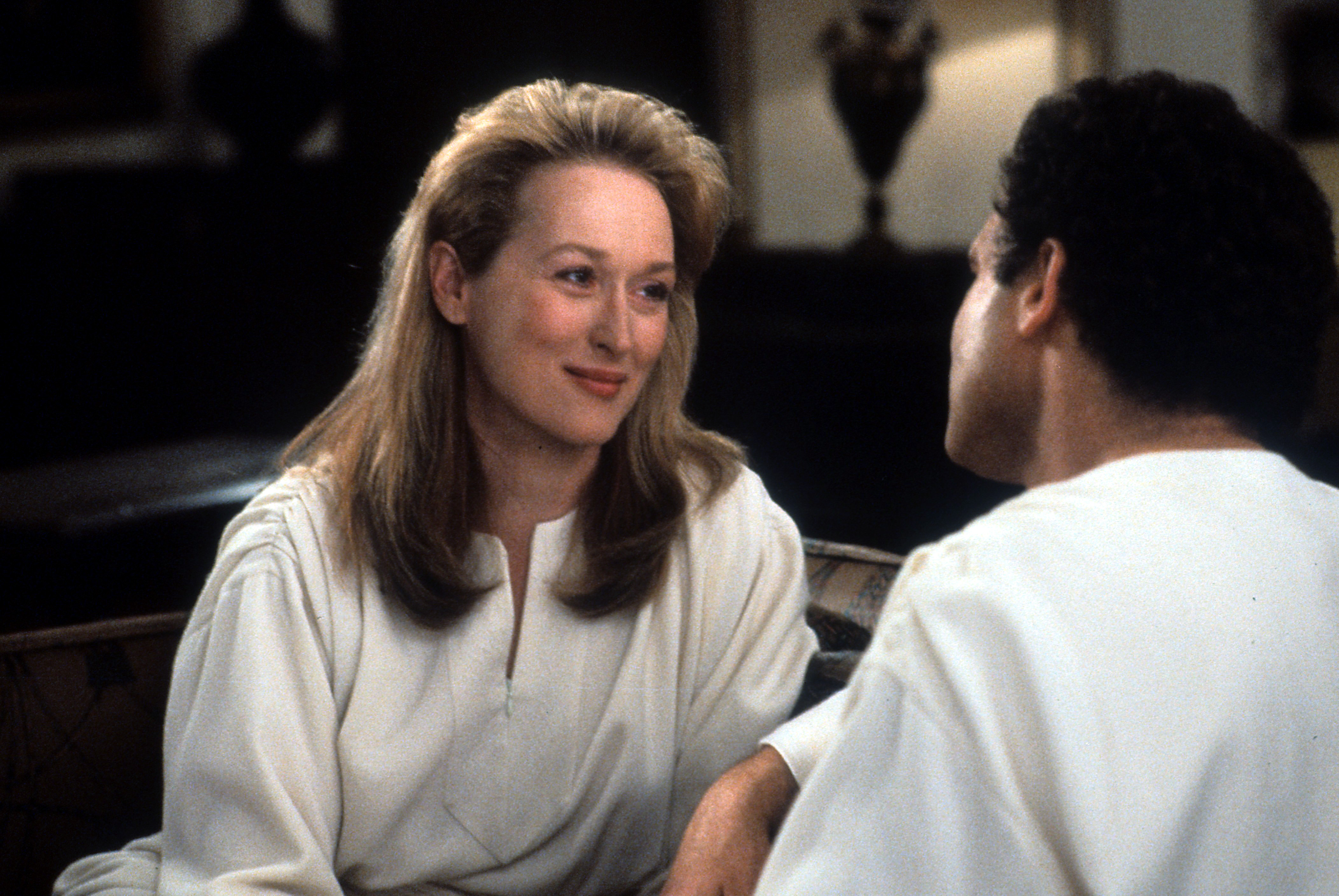 Meryl Streep And Albert Brooks filming "Defending Your Life,"  circa 1991. | Source: Getty Images