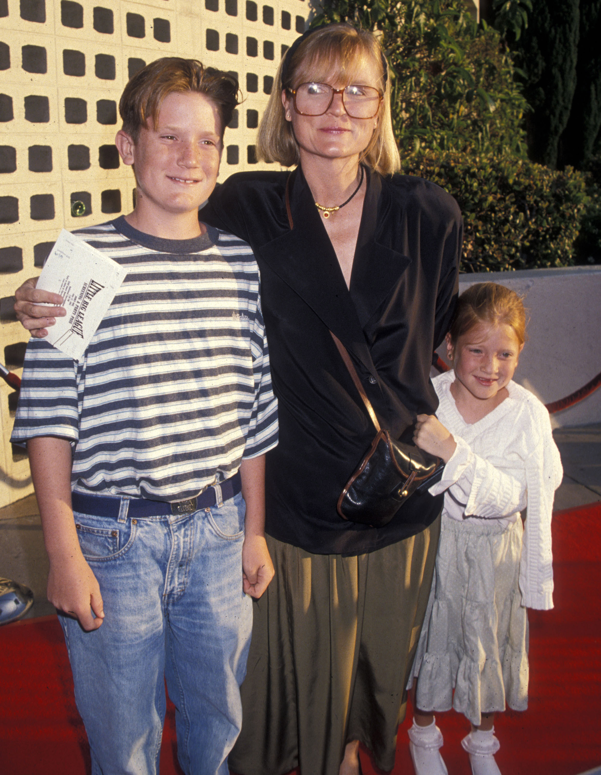 Daniel Weisman, Constance McCashin, and Marguerite Weisman at the "Little Big League" Hollywood Premiere on June 27, 1994, in Hollywood, California | Source: Getty Images