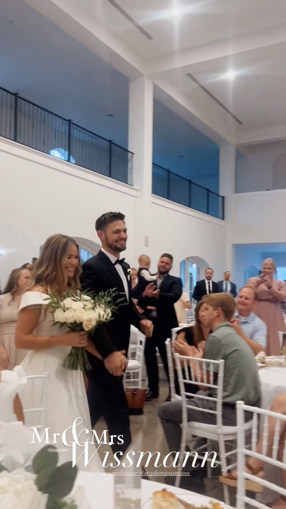 The wedding guests warmly greet Jana Duggar and Stephen Wissmann as they enter the reception hall, as shared in an Instagram Story in August 2024 | Source: Instagram/alaythia.wissmann