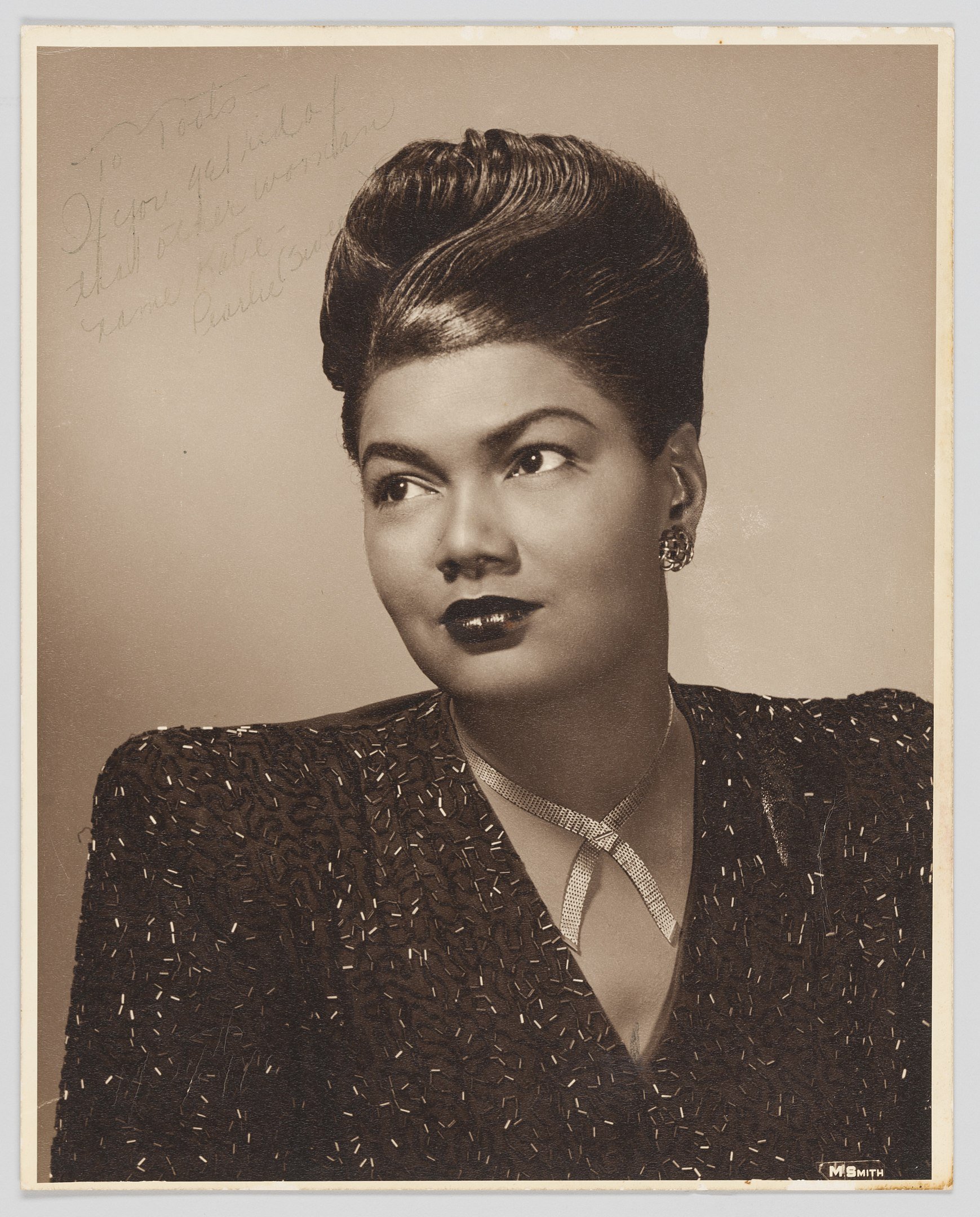A black and white photo of Pearl Bailey taken in 1960 with an autograph of the actress | Photo, Wikimedia Commons Images, By Marvin Smith CC0