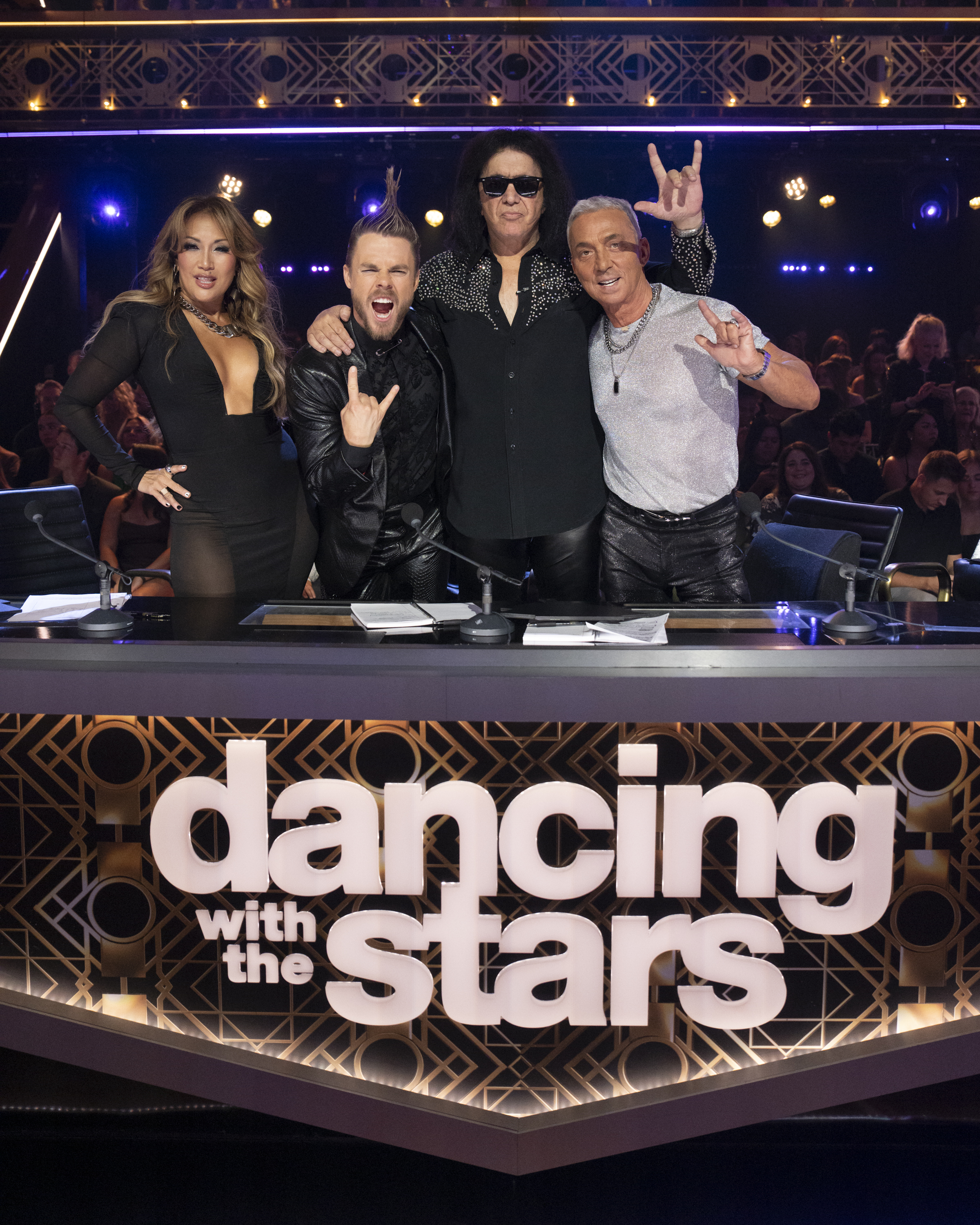 The "DWTS" judges posing for a picture with guest judge Gene Simmons. | Source: Getty Images