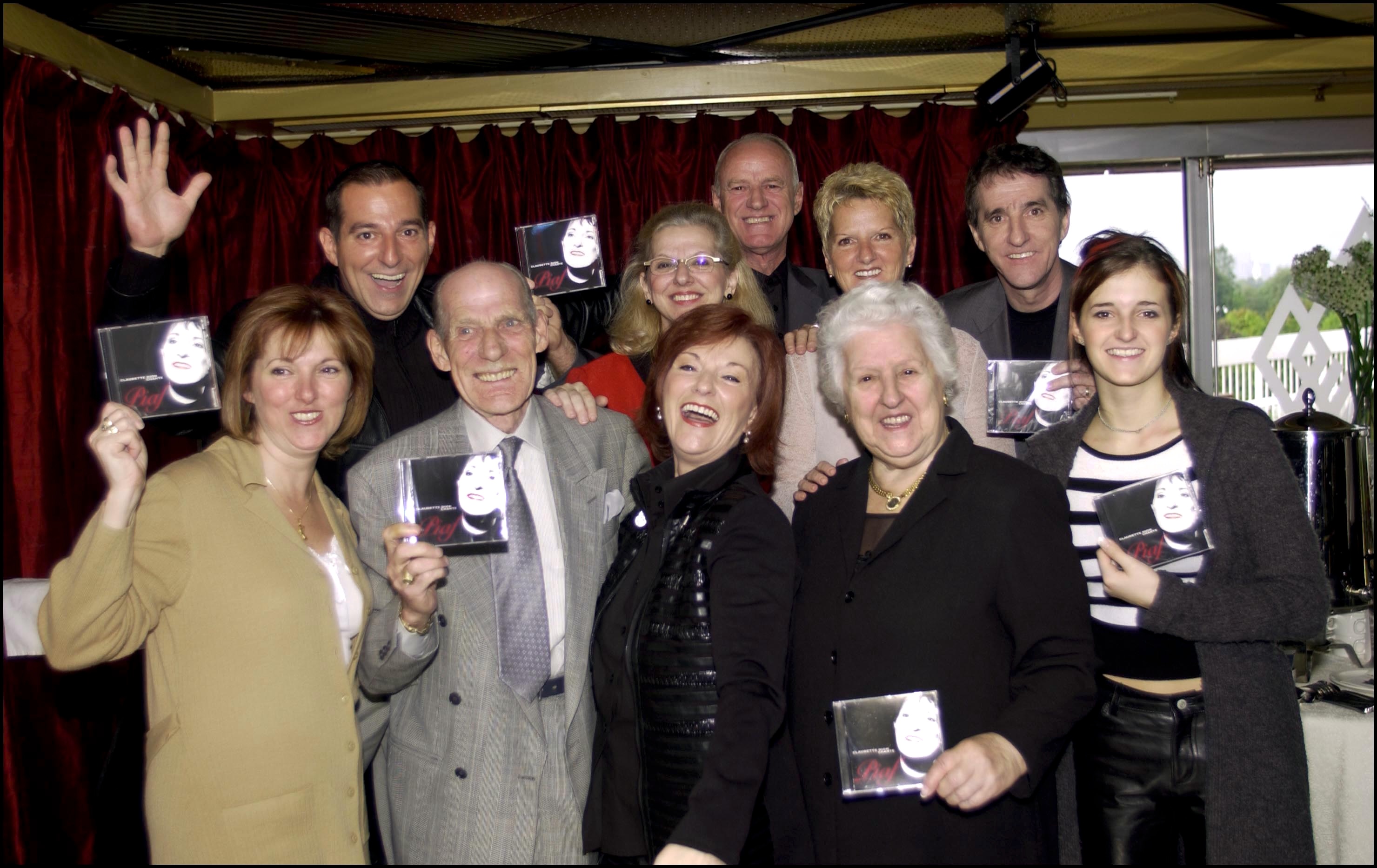Claudette, Adhémar, and Thérèse Dion with other siblings and relatives in Montreal, Canada, on October 11, 2002. | Source: Getty Images
