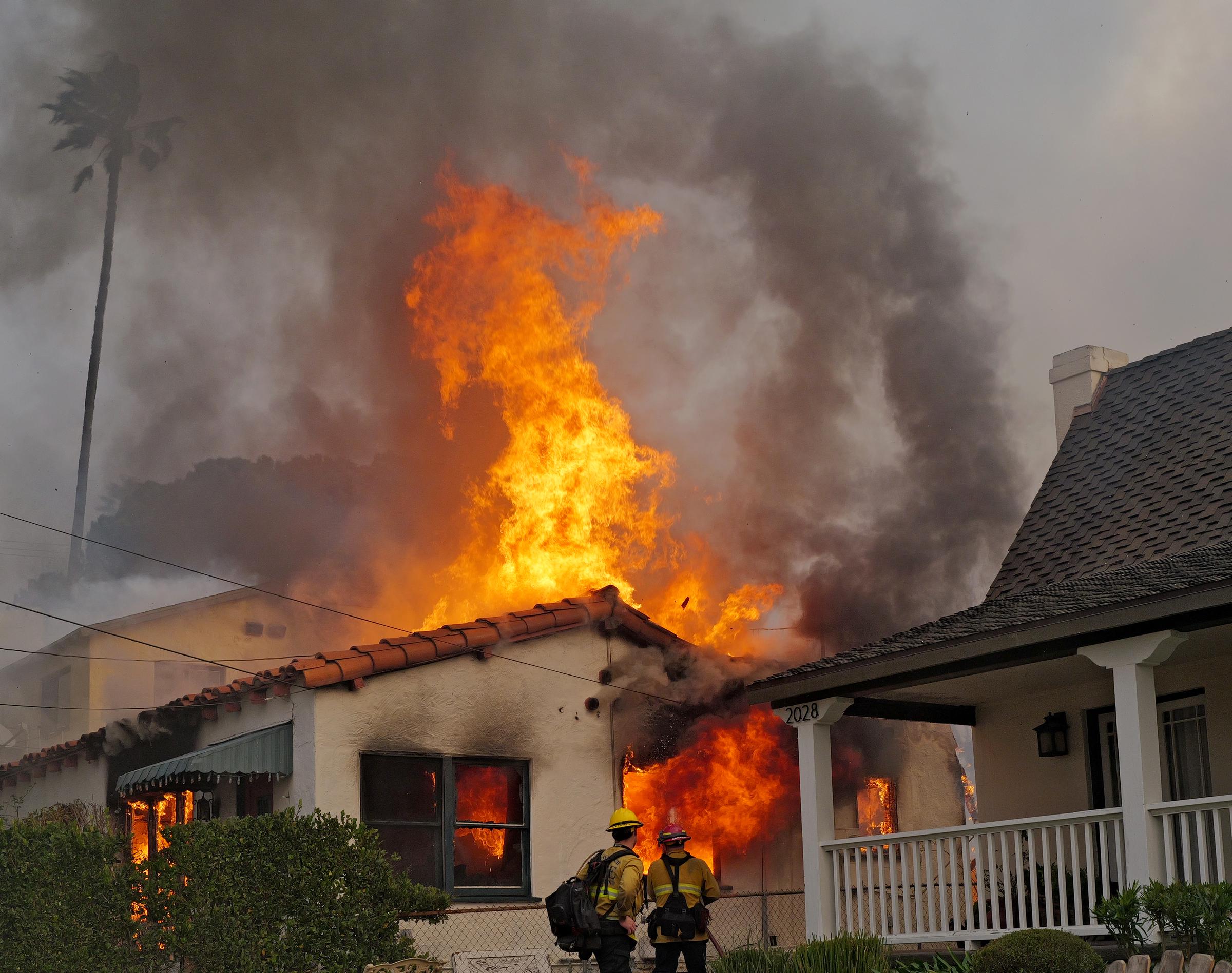 A home engulfed by flames caused by the Eaton Fire in the Altadena neighborhood in Pasadena, California on January 8, 2025. | Source: Getty Images