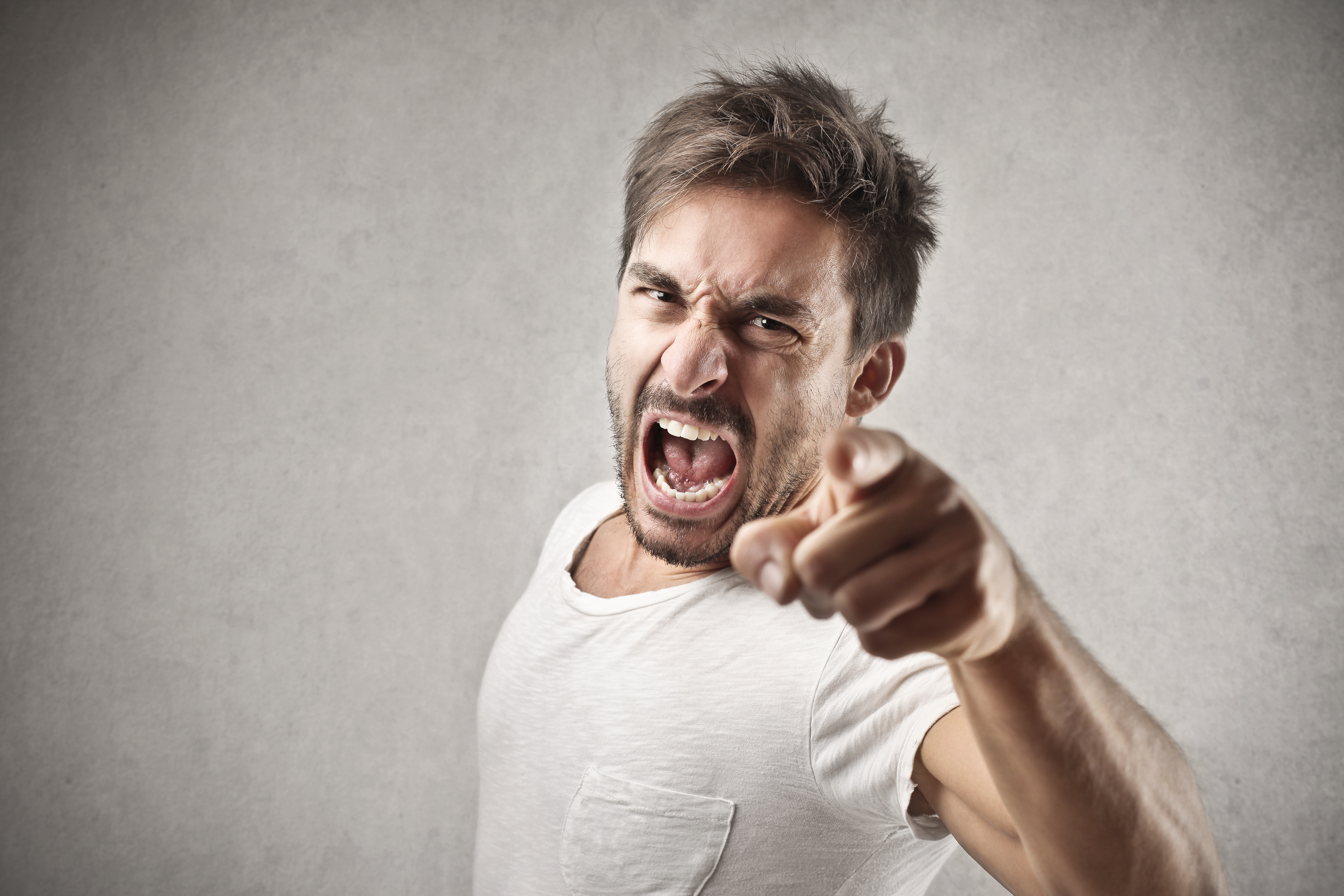 Portrait of a angry young man. | Source: Shutterstock