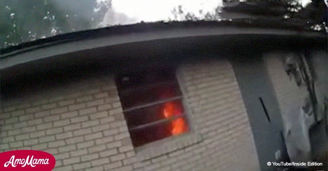 Woman can thank her lucky stars for being saved from a house fire in dramatic bodycam video