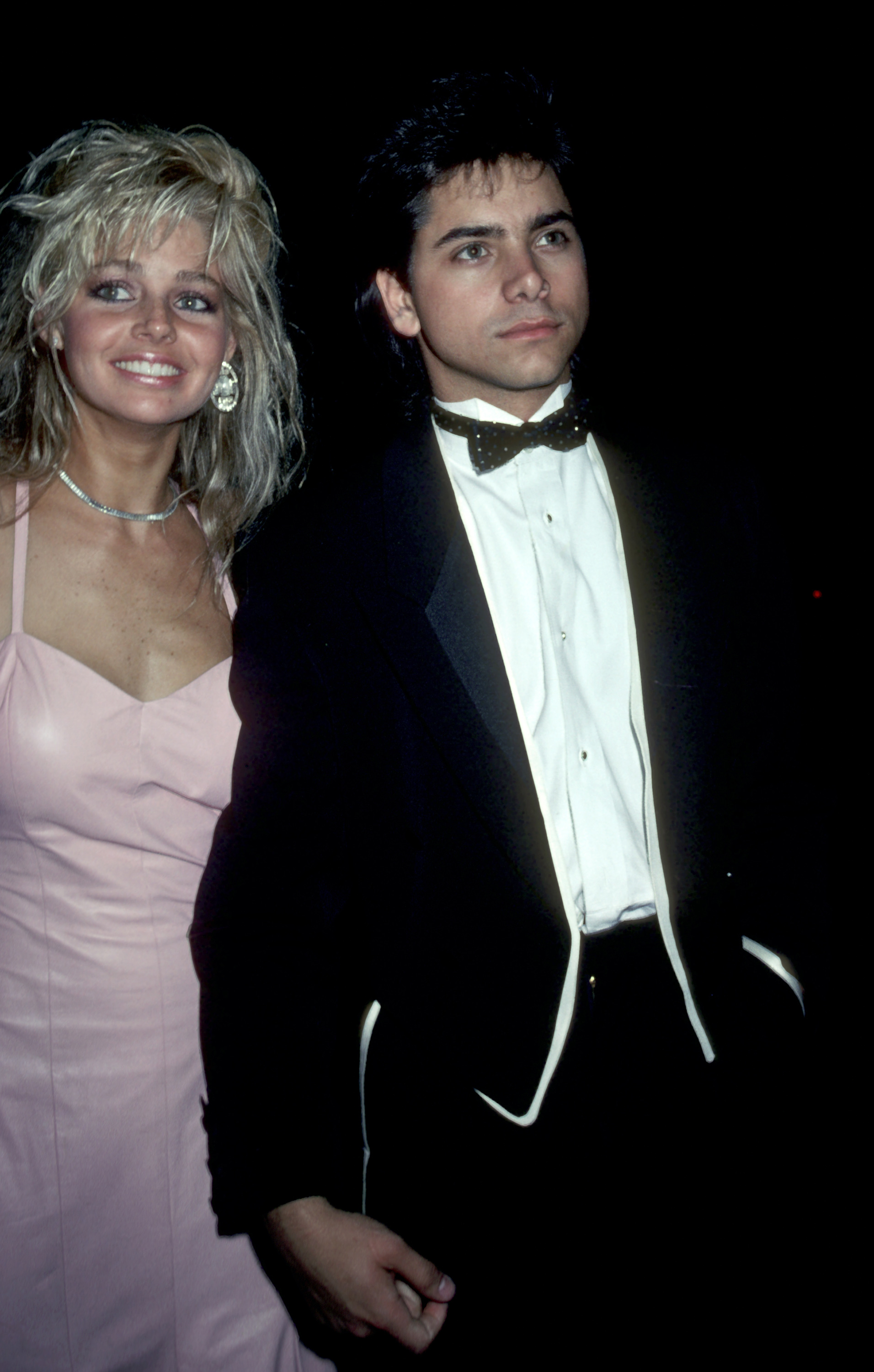 Teri Copley and John Stamos at Hollywood Palladium on April 1, 1985 in Hollywood, California. | Source: Getty Images