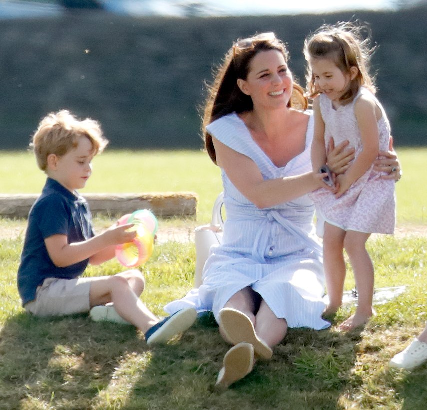 Prince George, Kate Middleton and Princess Charlotte during the Maserati Royal Charity Polo Trophy at the Beaufort Polo Club on June 10, 2018 in Gloucester, England. / Source: Getty Images