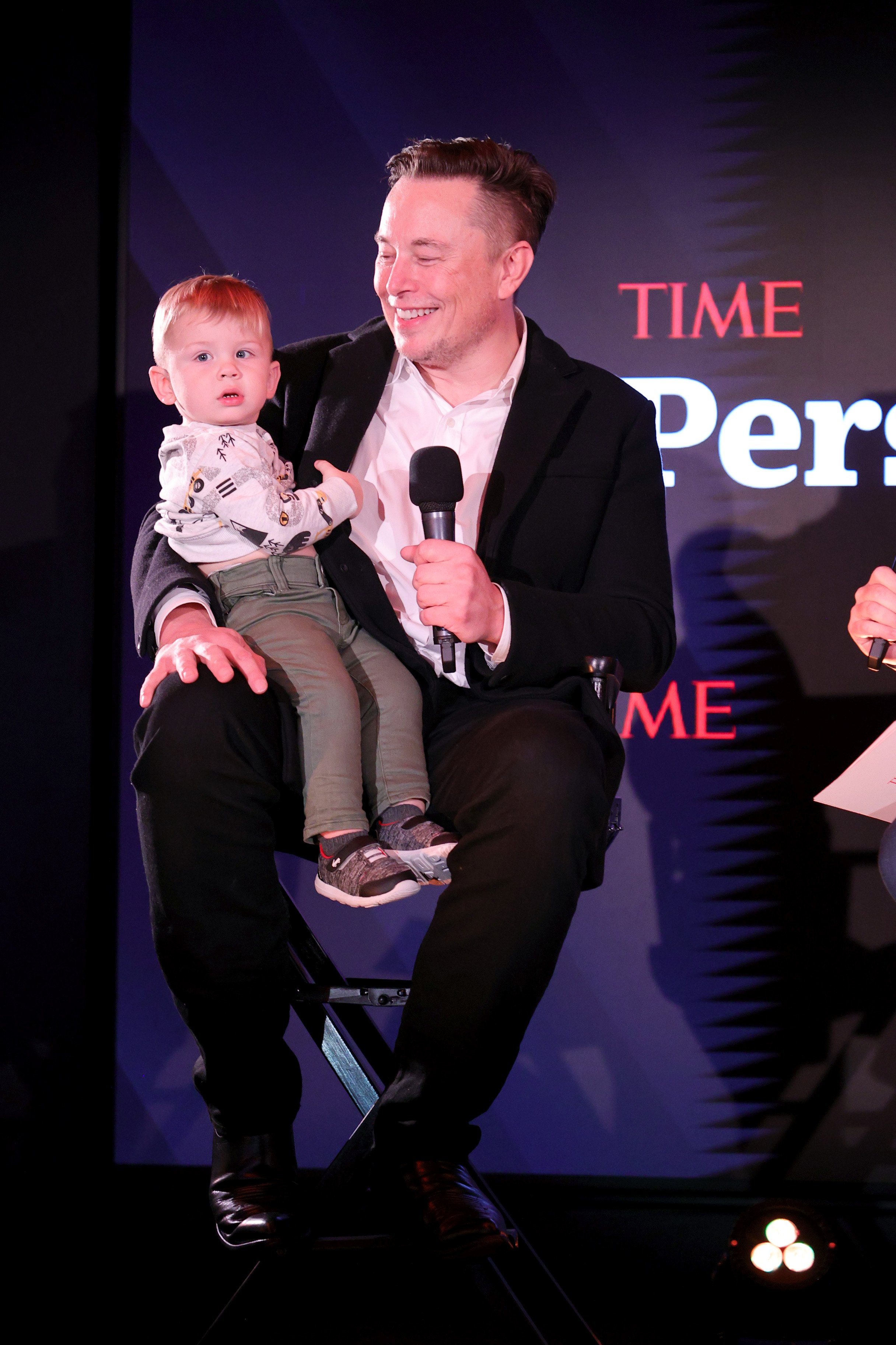 Elon Musk and son X Æ A-12 are pictured on stage at TIME Person of the Year on December 13, 2021, in New York City | Source: Getty Images