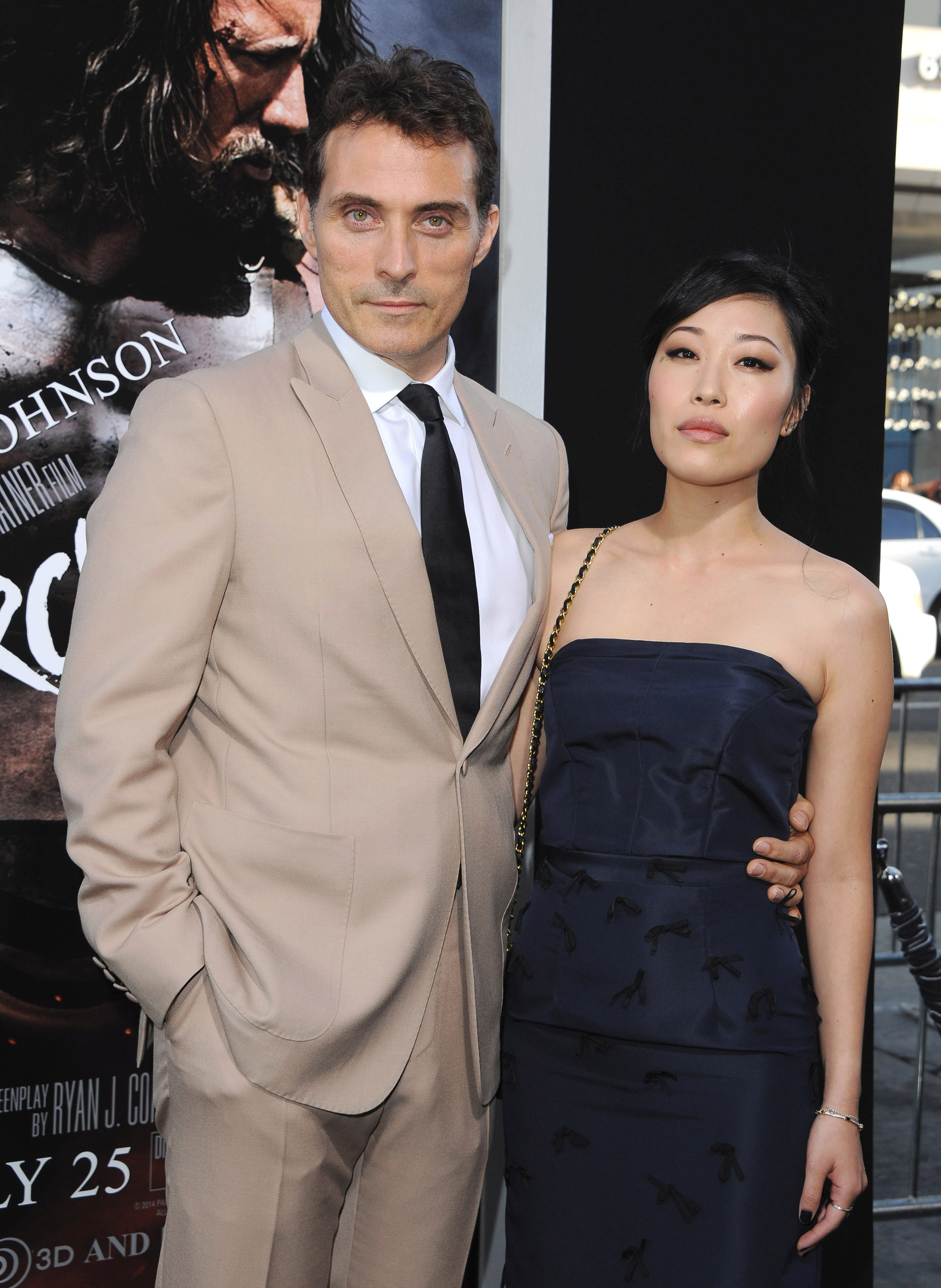 Rufus Sewell and Ami Komai at the Los Angeles premiere of "Hercules" on July 23, 2014, in California | Source: Getty Images