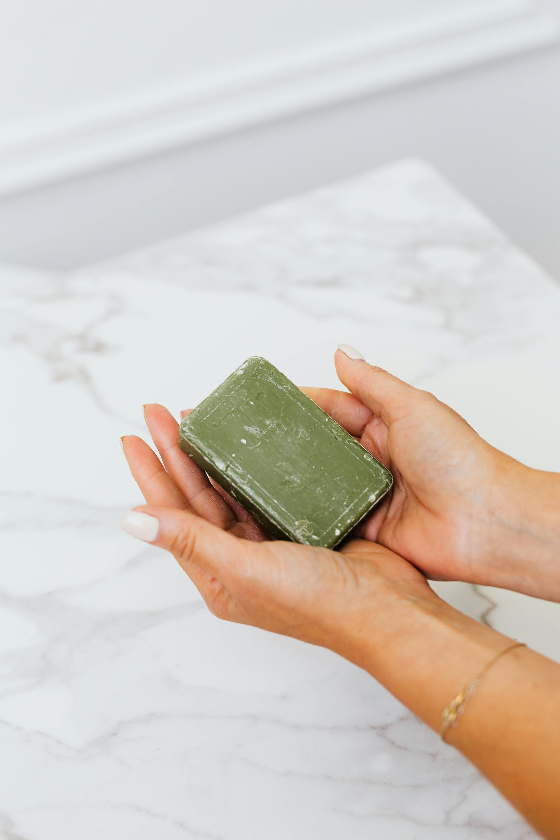 A woman holding a soap bar | Source: Pexels